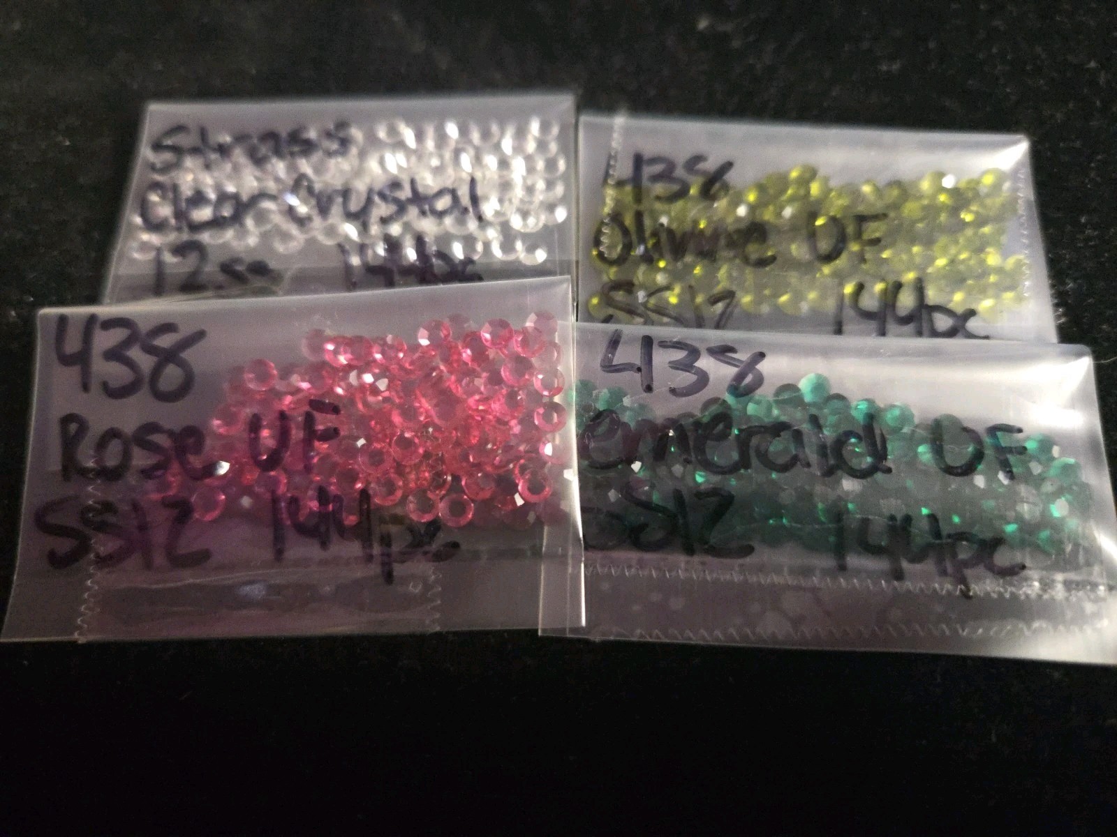 NOS Preciosa Lot. Incomplete Packs And Flatback Rhinestones Of Various Colors.