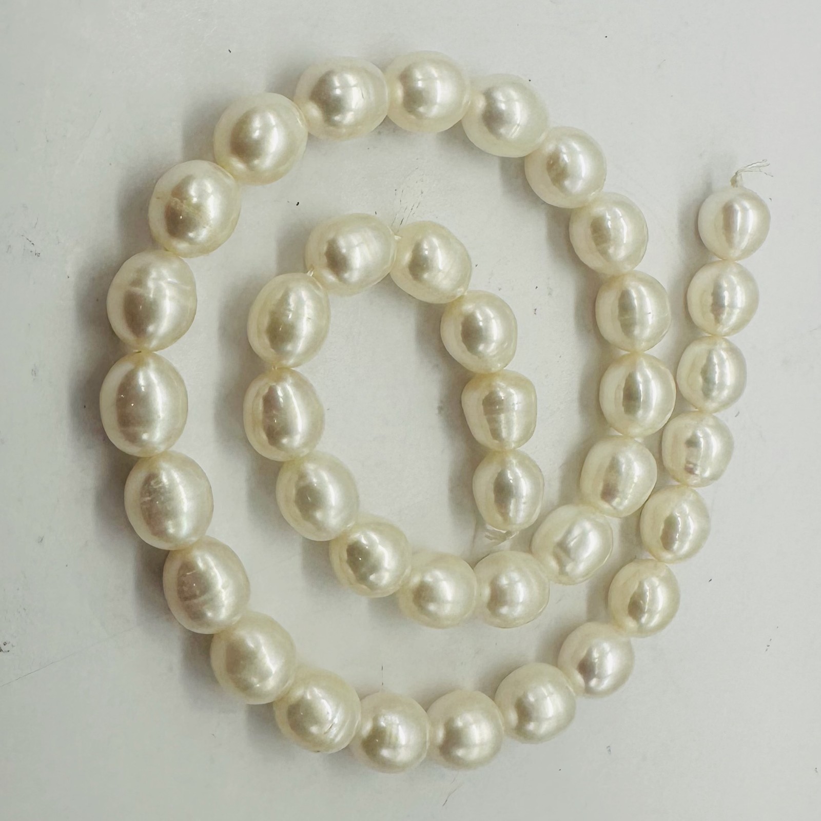 White Pear Shaped Fresh Water Pearls 16″ Strand | 12×10 to 10x9mm |