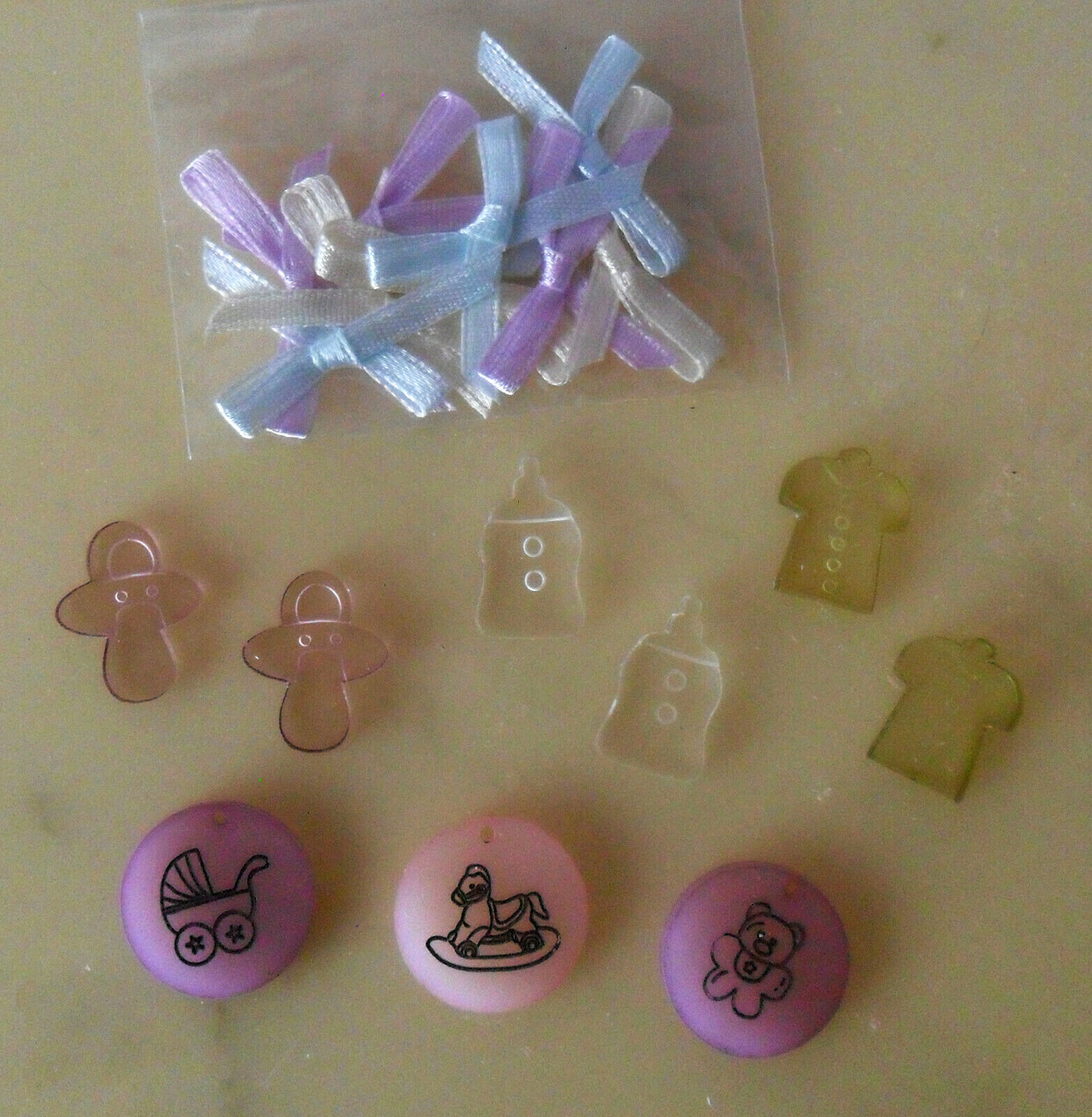Lot of 9 Clear Plastic CHARMS to sew or Glue + 9 Tiny Ribbon BOWS, Baby Theme