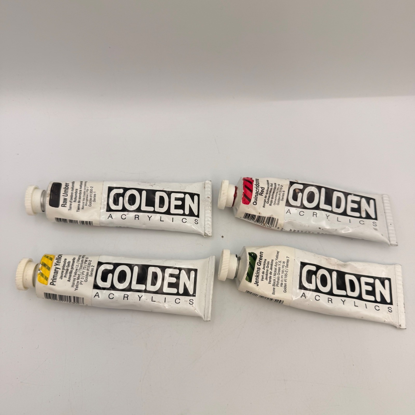 Golden Heavy Body Acrylic Paint Set 2oz Tubes Yellow Green Red Raw Umber 4 Pack