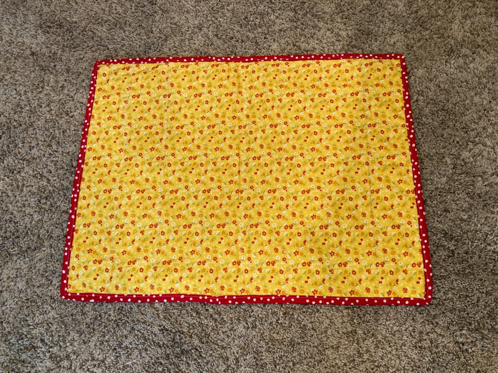 Handmade table topper – red and yellow pinwheels – 18” x 24”