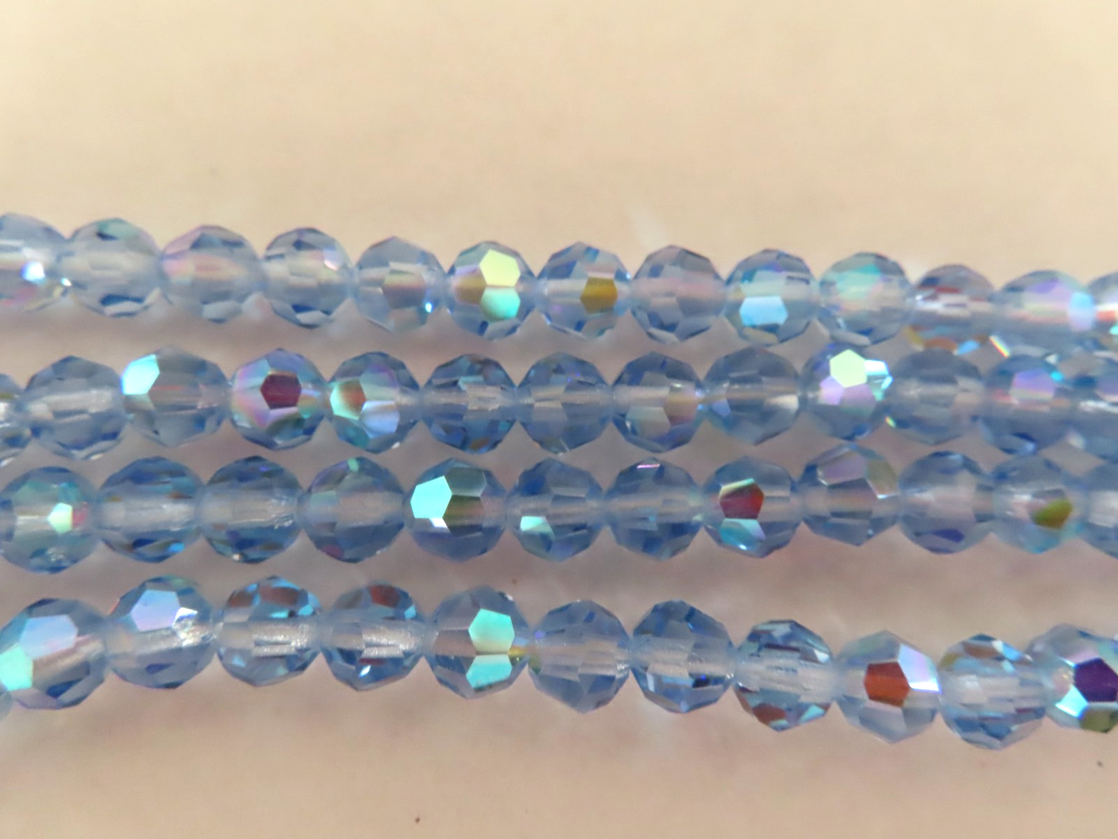 Strand 120 Czech. round faceted Machine Cut Beads 6mm Lt. Sapphire AB