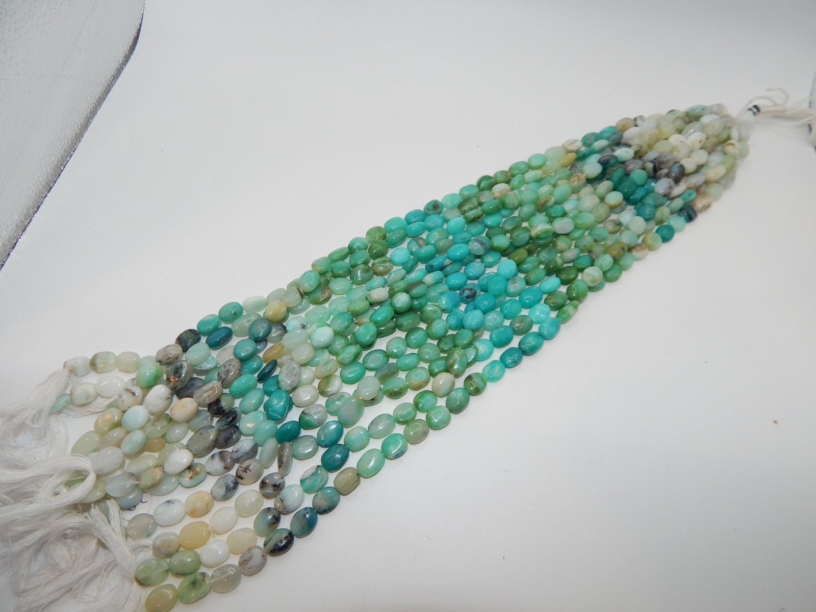 Peruvian Opal mixed Round and Oval beads (vary from 12mm x 9mm to 9mm x 7mm)