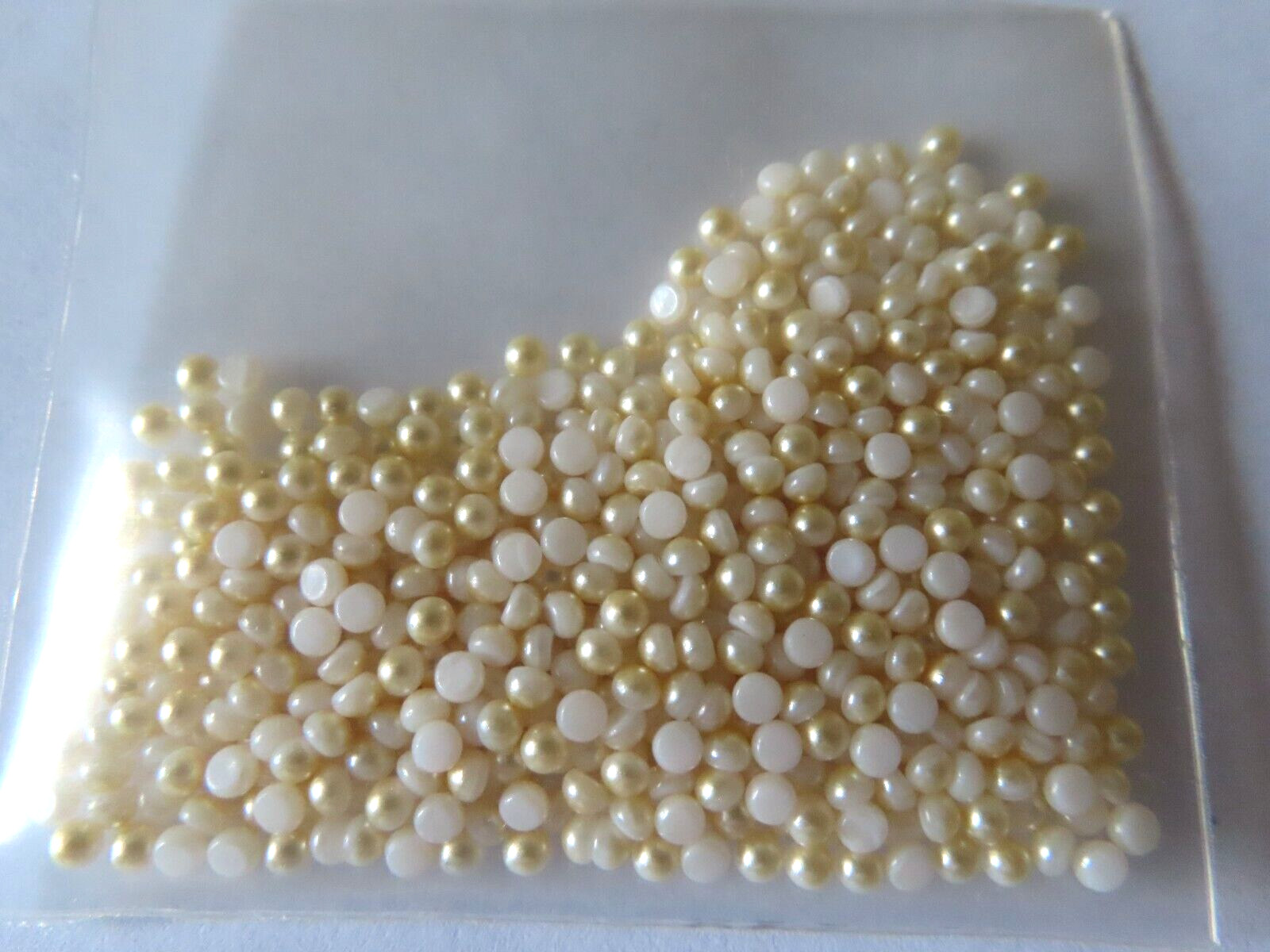 Sealed bags of 600 Czech. glass cabochones 2.5mm Pearl Cream