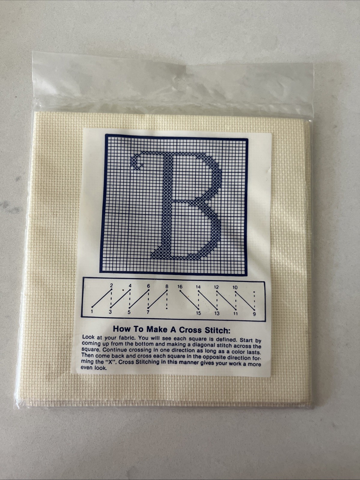 New Flamingo Mills – Cross Stitch Fabric – 18 Count AIDA – 12” x 18” Beige. I-1