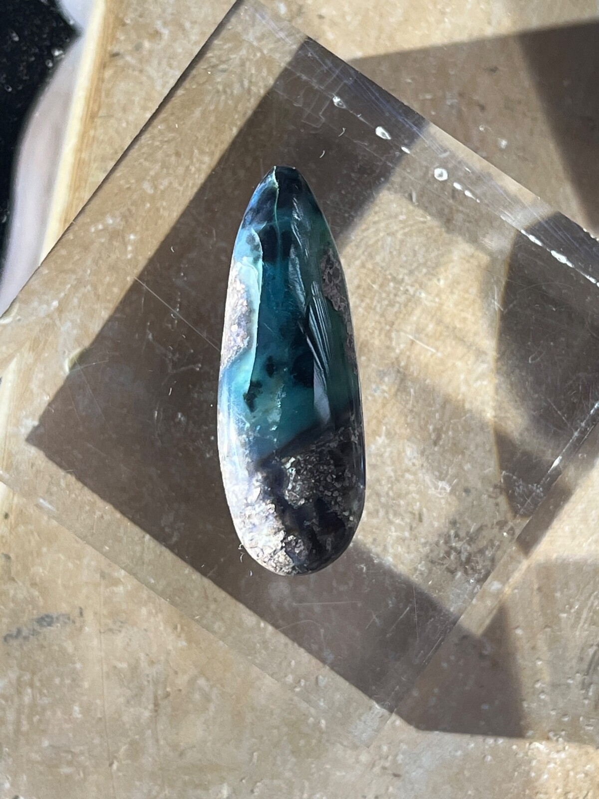 Needles Blue Agate 23.7 Cab in Rhyolite Porphyry Pear tear drop Blue Danube , AZ