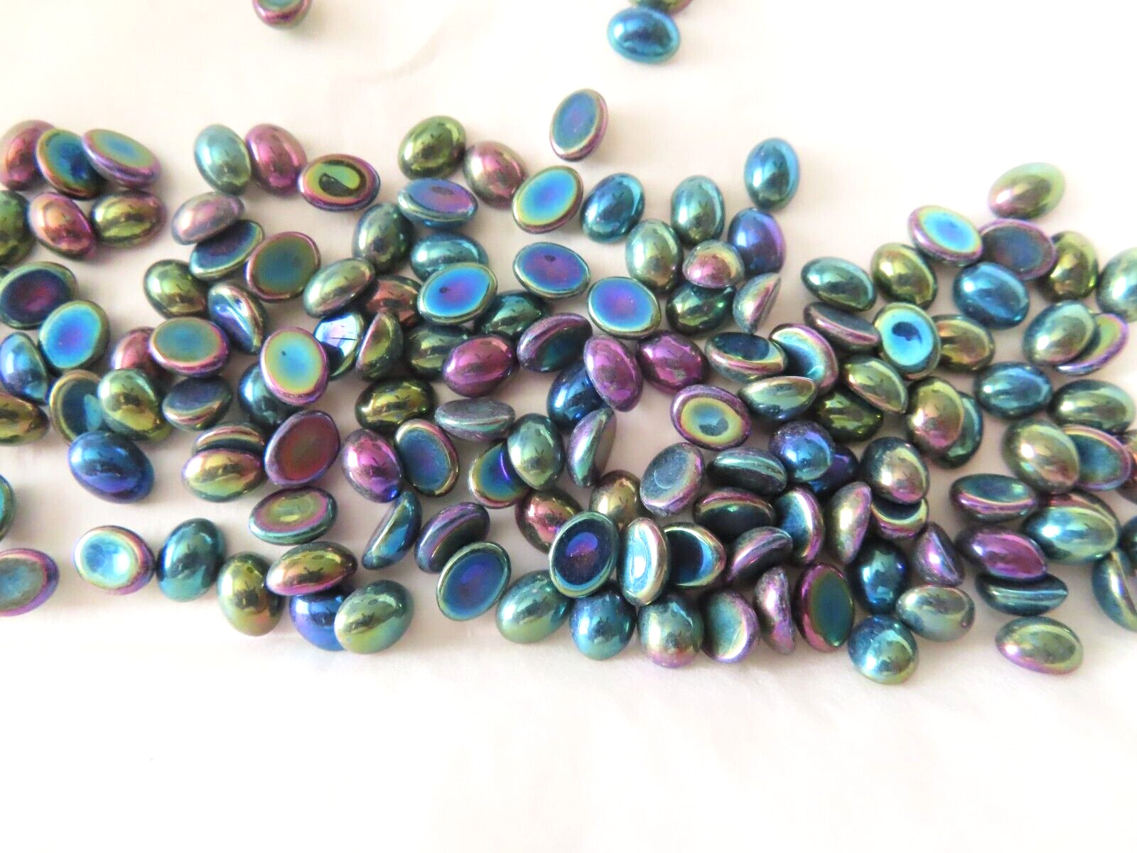 Full pack 144 Preciosa Oval Glass Cabochones 8x6mm Green Iris. #59155