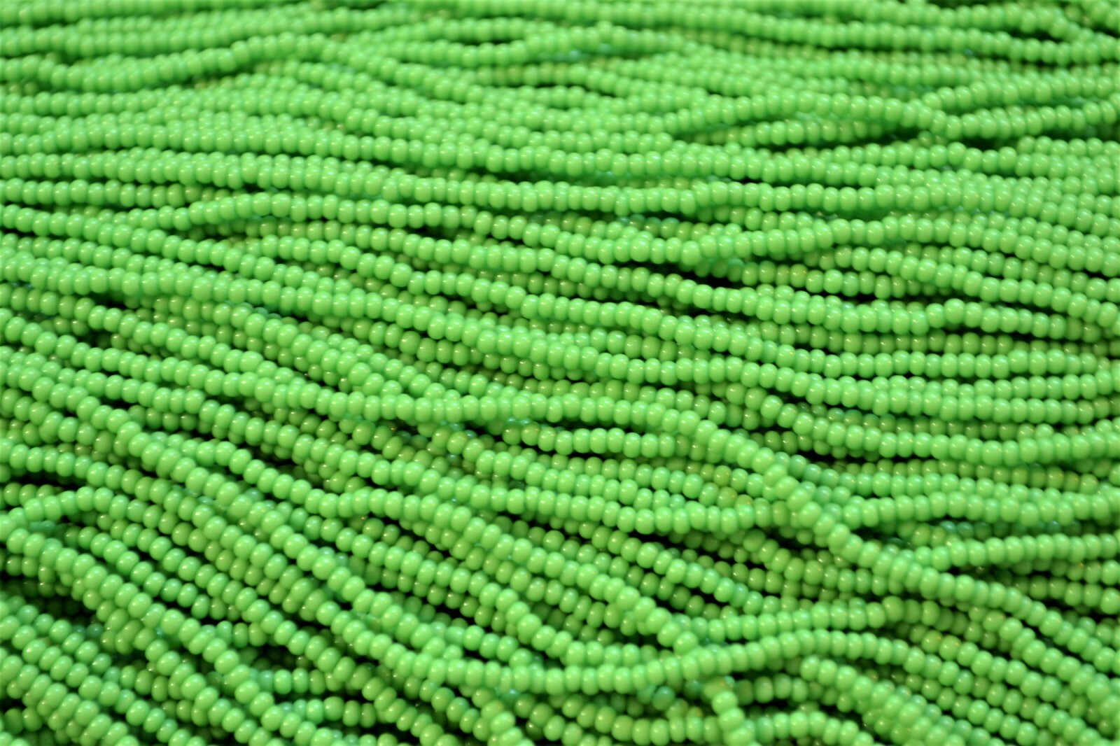 Opaque Light Green PRECIOSA® Czech glass 11/0 seed beads, 1 Hank/12 strands