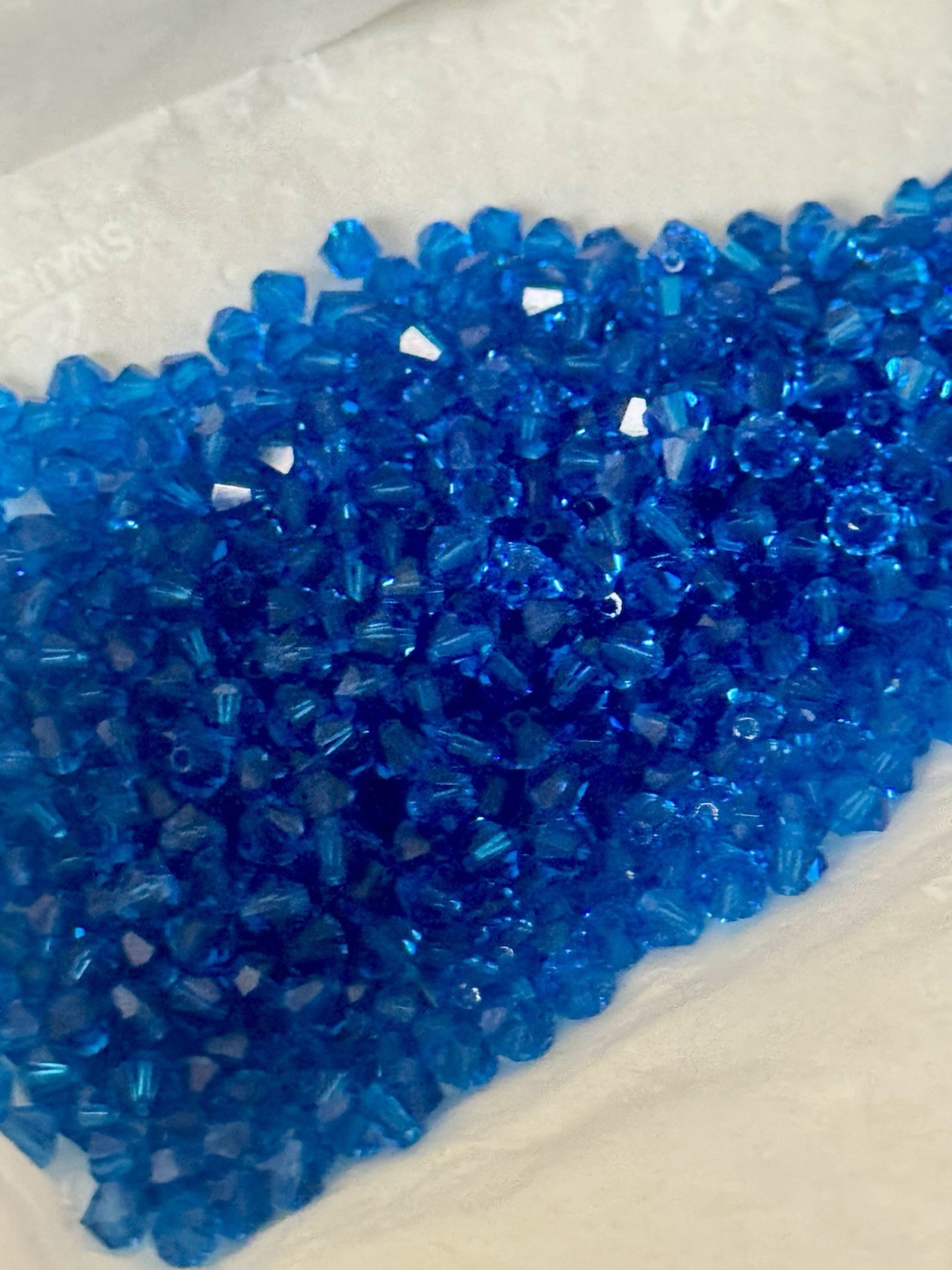 24 pieces Genuine Austrian Swarovski Crystal 4mm Bicone Beads Capri Blue #5301