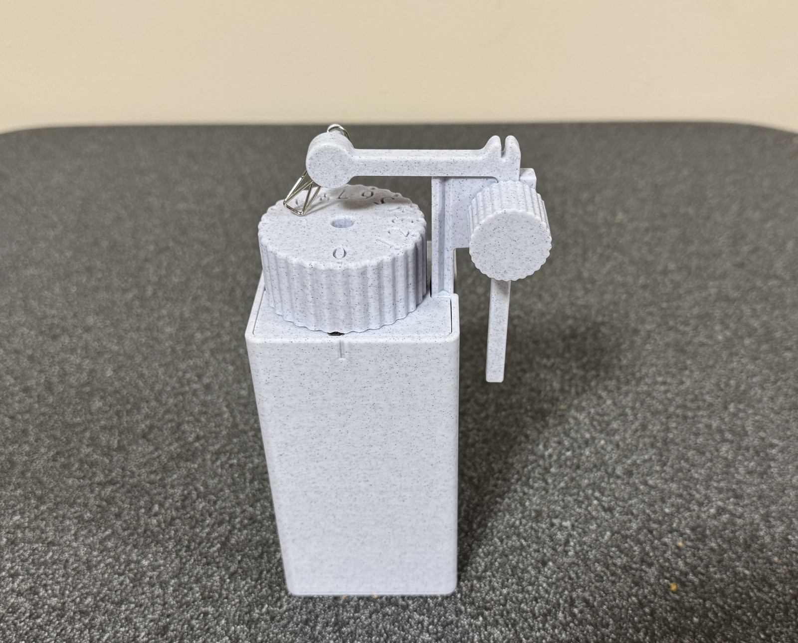 Tea timer with tea bag lifter. Patent pending, made in USA.