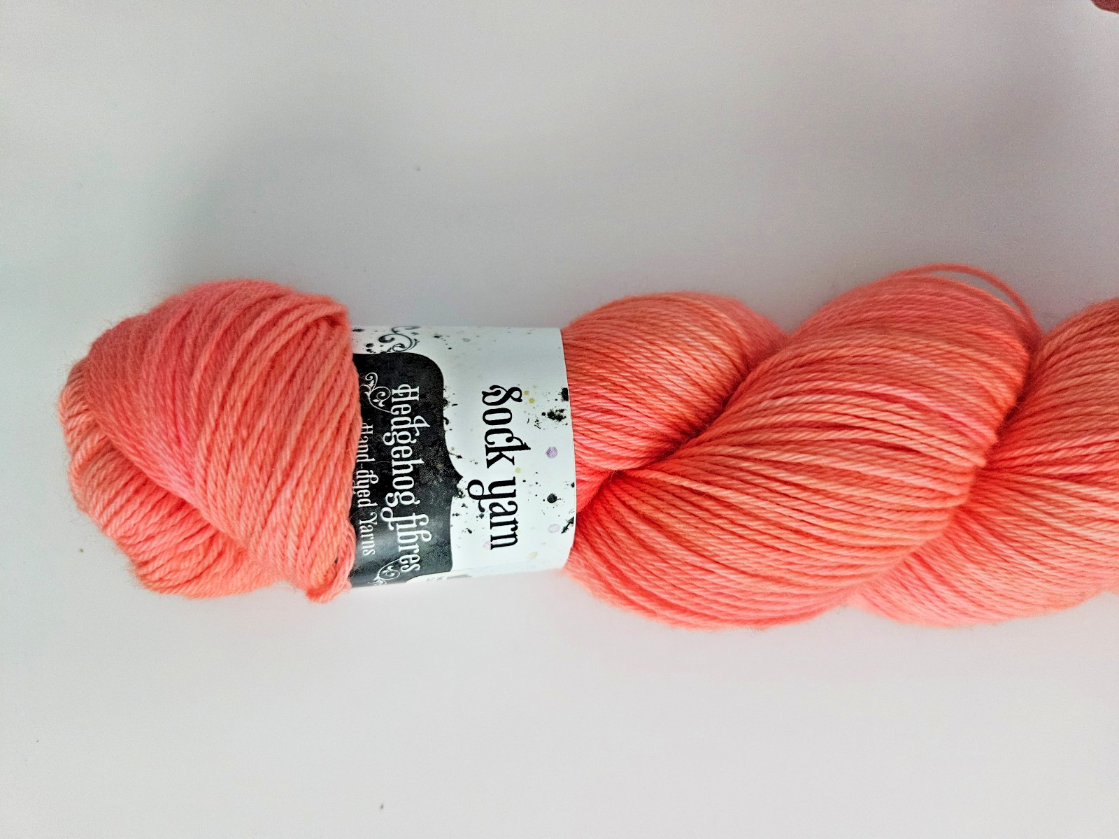 Hedgehog Fibres Hand Dyed Sock Yarn Merino / Nylon Blend Neon Orange Coral