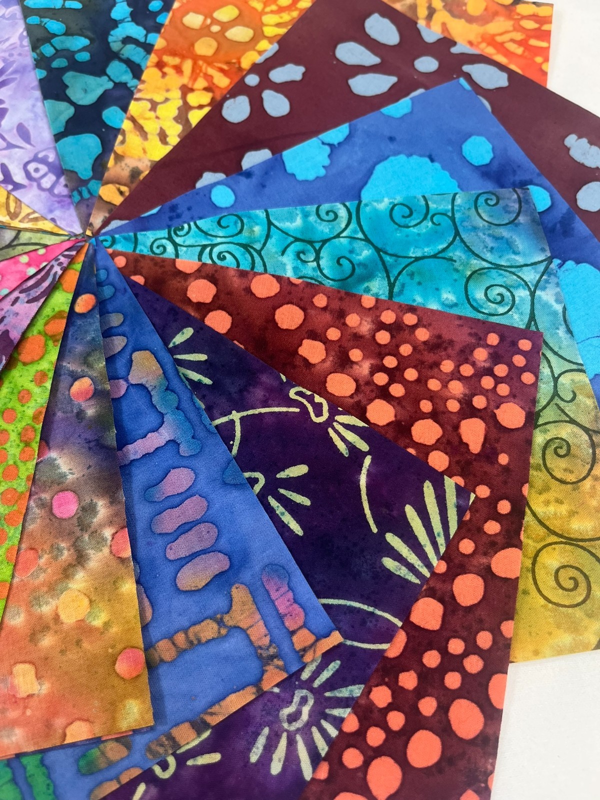 Mixed Batik Prints ~ 42 5″ Squares ~ Charm Pack of Batiks