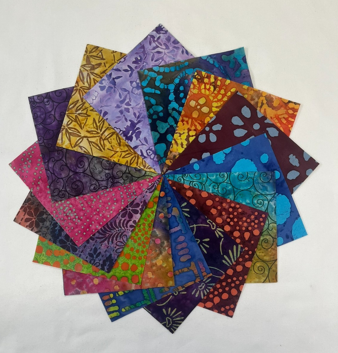 Mixed Batik Prints ~ 42 5″ Squares ~ Charm Pack of Batiks
