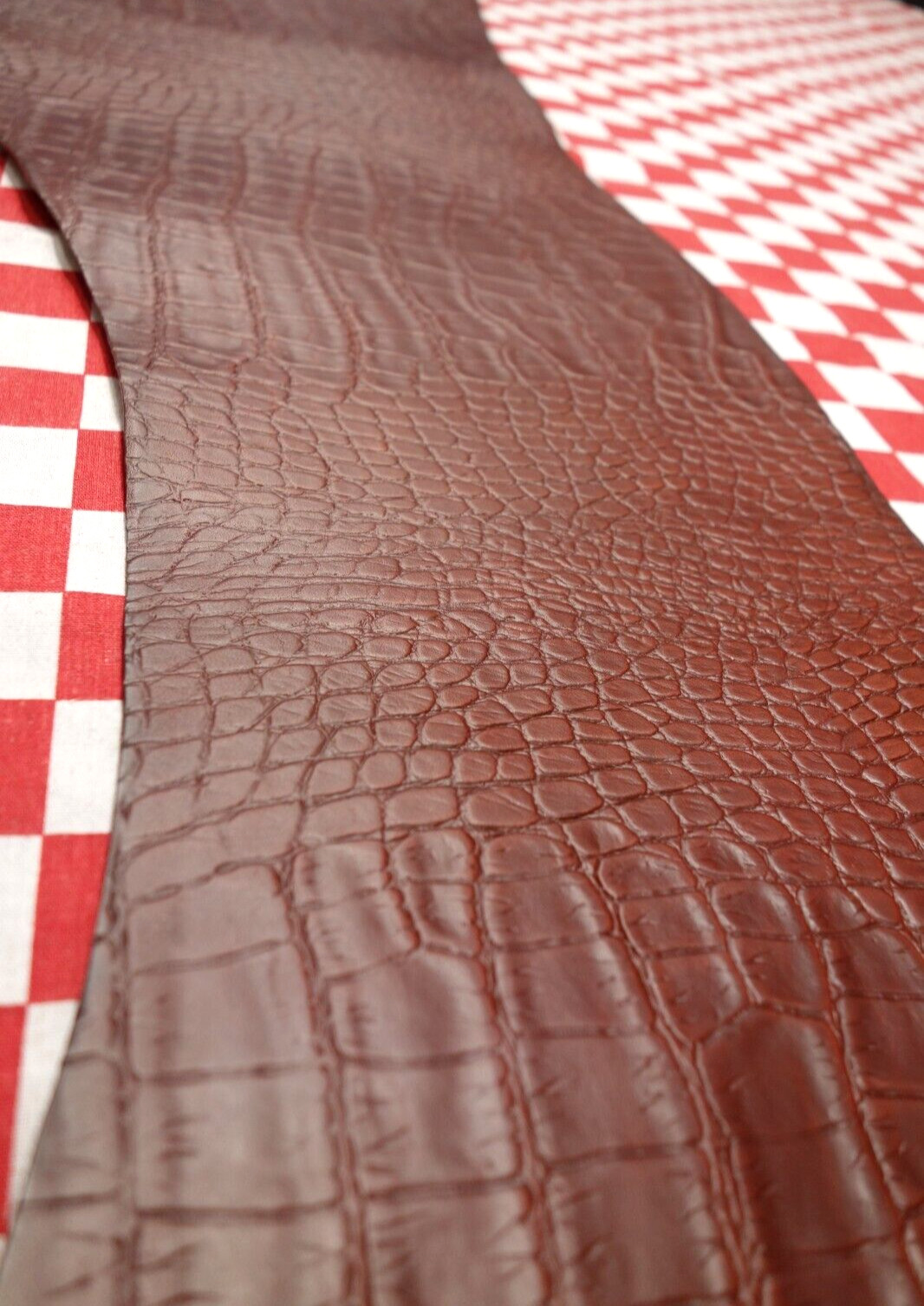 Embossed Tan Chromexcel Horsebutt Alligator Strip. 2.9 Square feet. 5 oz.