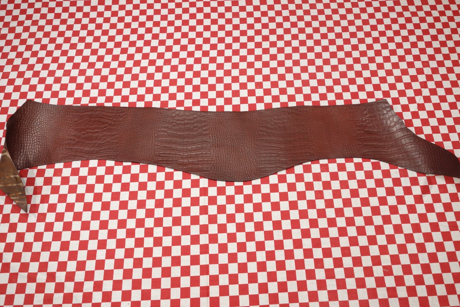 Embossed Tan Chromexcel Horsebutt Alligator Strip. 2.9 Square feet. 5 oz.