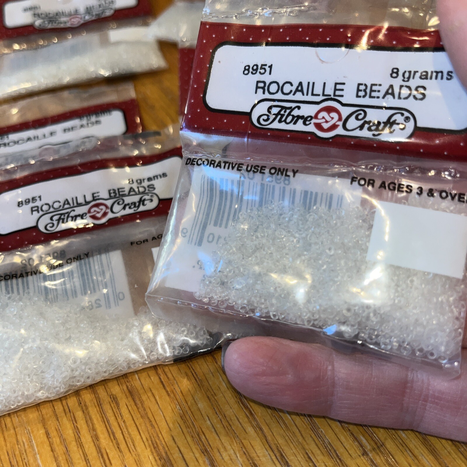 fibre craft Rocaille Beads # 8951 clear -7 bags each bag 8 grams
