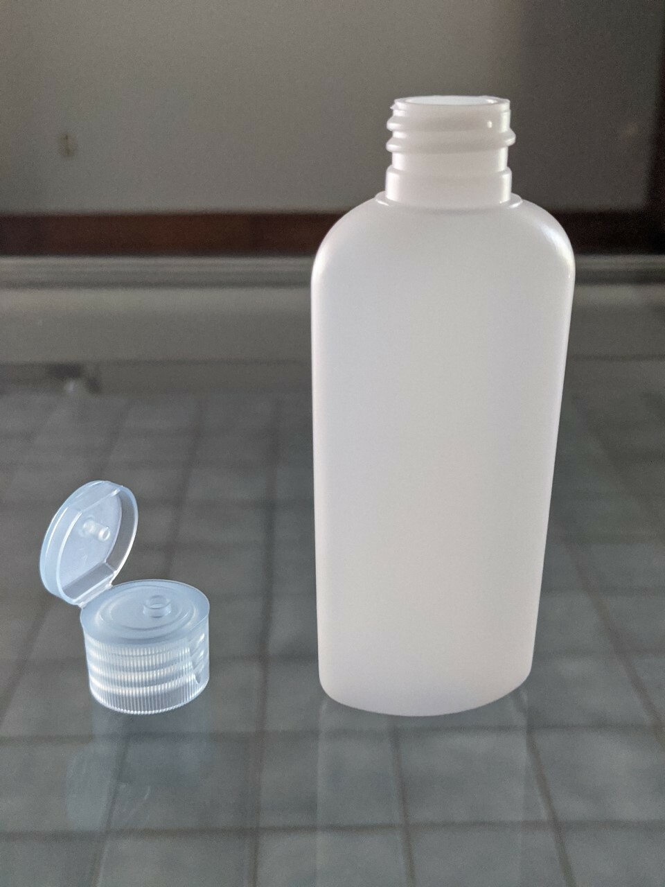 2 oz Classic Oval Bottle Natural HDPE With Dispensing Lid 