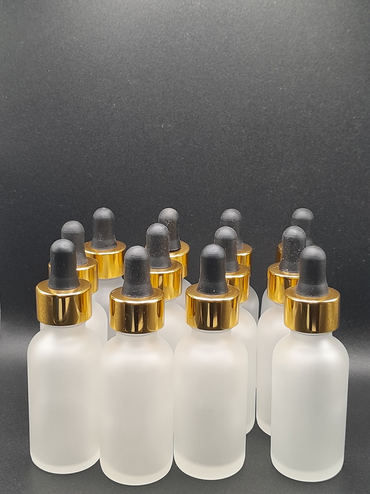 2 DOZEN FROSTED 1 OZ BOTTLES WITH DROPPER 20/400 NECK.