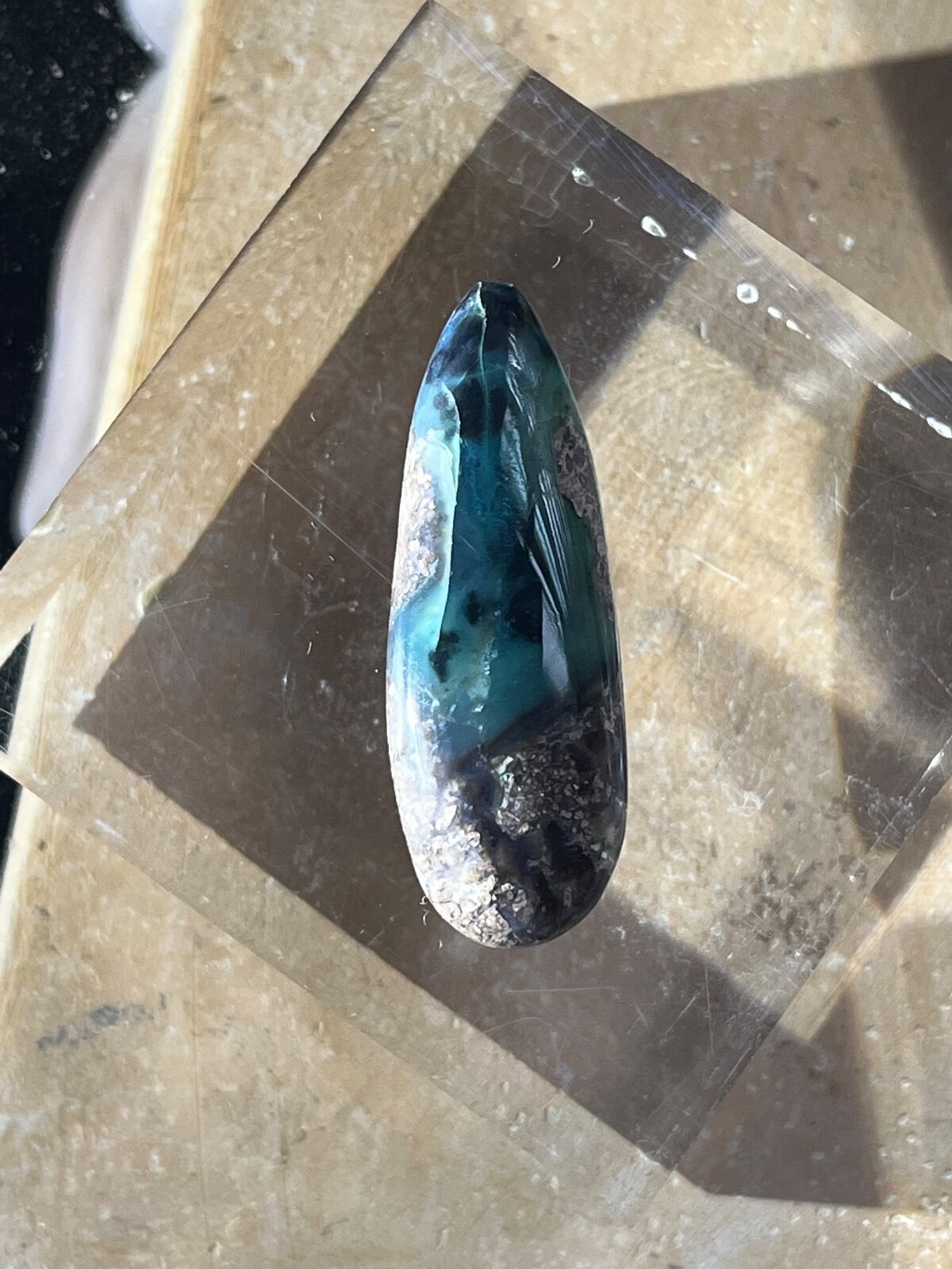 Needles Blue Agate 23.7 Cab in Rhyolite Porphyry Pear tear drop Blue Danube , AZ