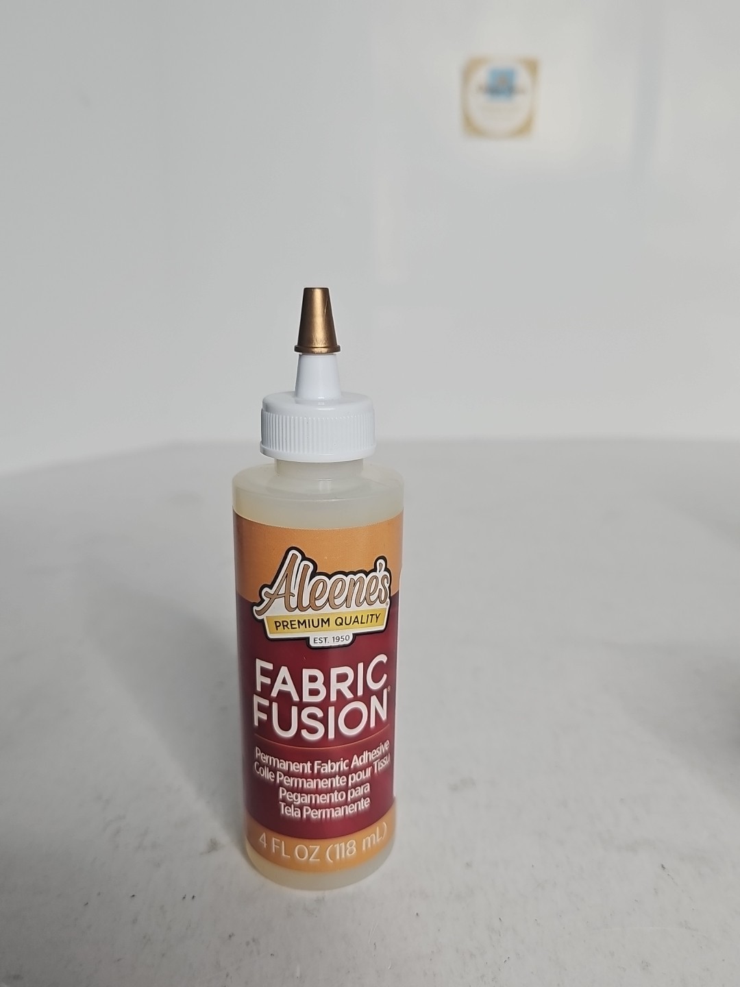 Aleene’s Fabric Fusion Permanent Fabric Adhesive 4 oz. Bottle
