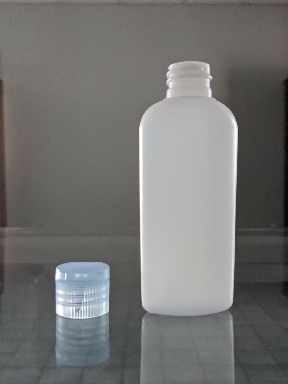 2 oz Classic Oval Bottle Natural HDPE With Dispensing Lid 
