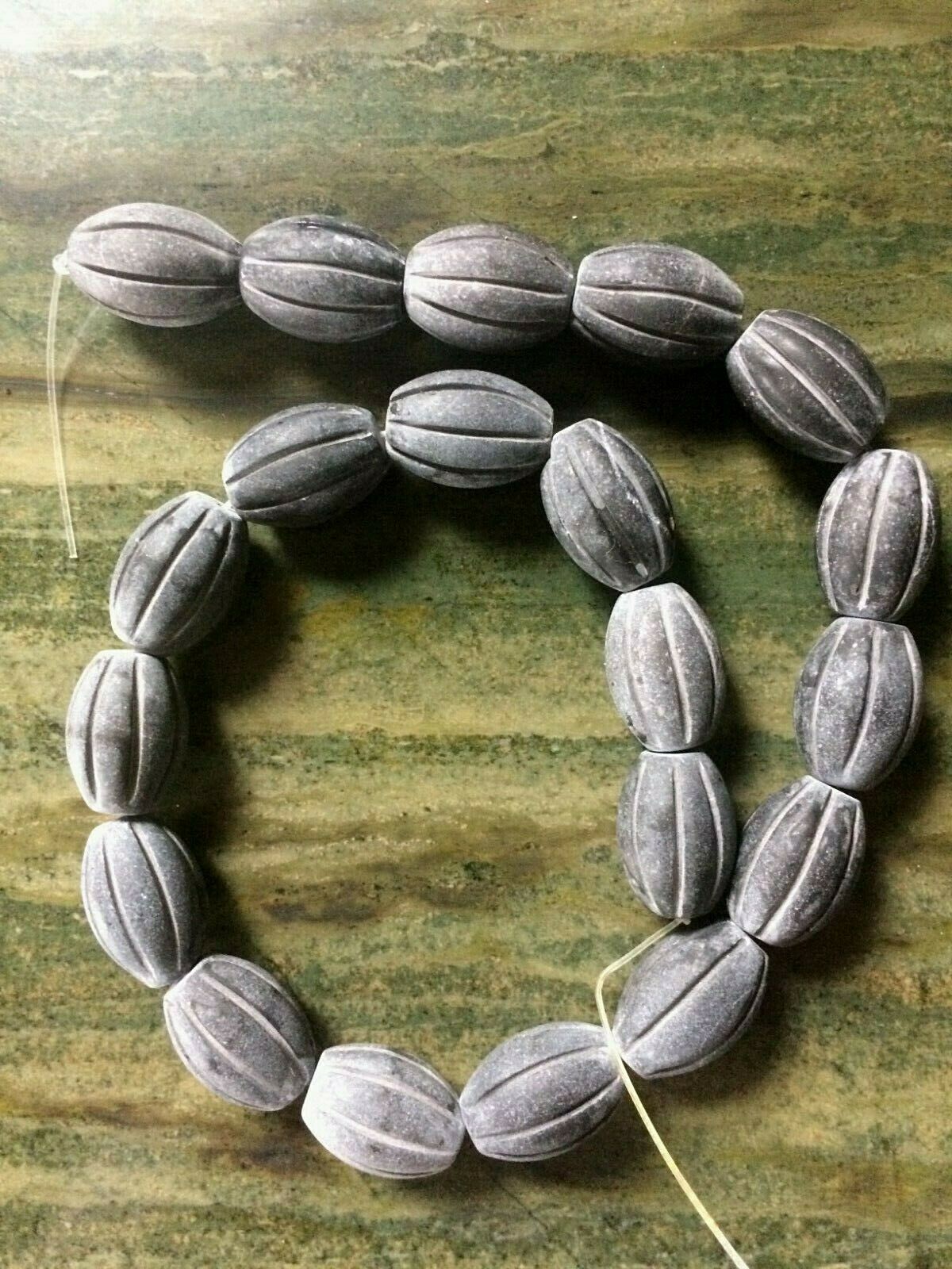 frosted matte black onyx hand carved oval melon beads 16″ strand