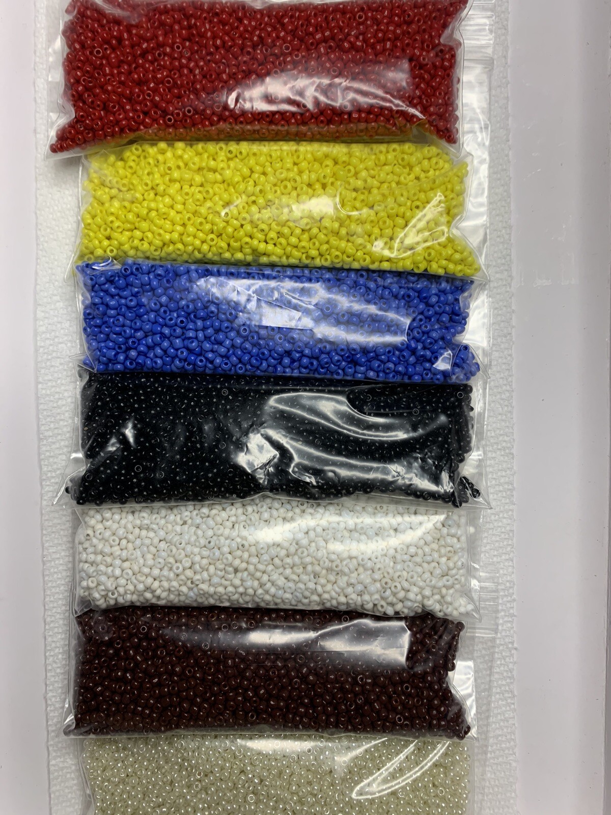 9/0 Lot 7 Colors 100 Grams Each Color 6 Opaque/1 Pearl Glass Seed Beads