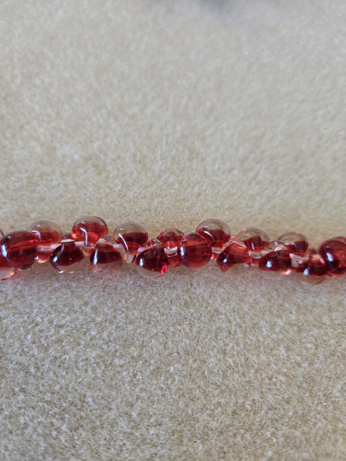 Unicorne Teardrop Glass Bead Strand, 9-10mm, Red