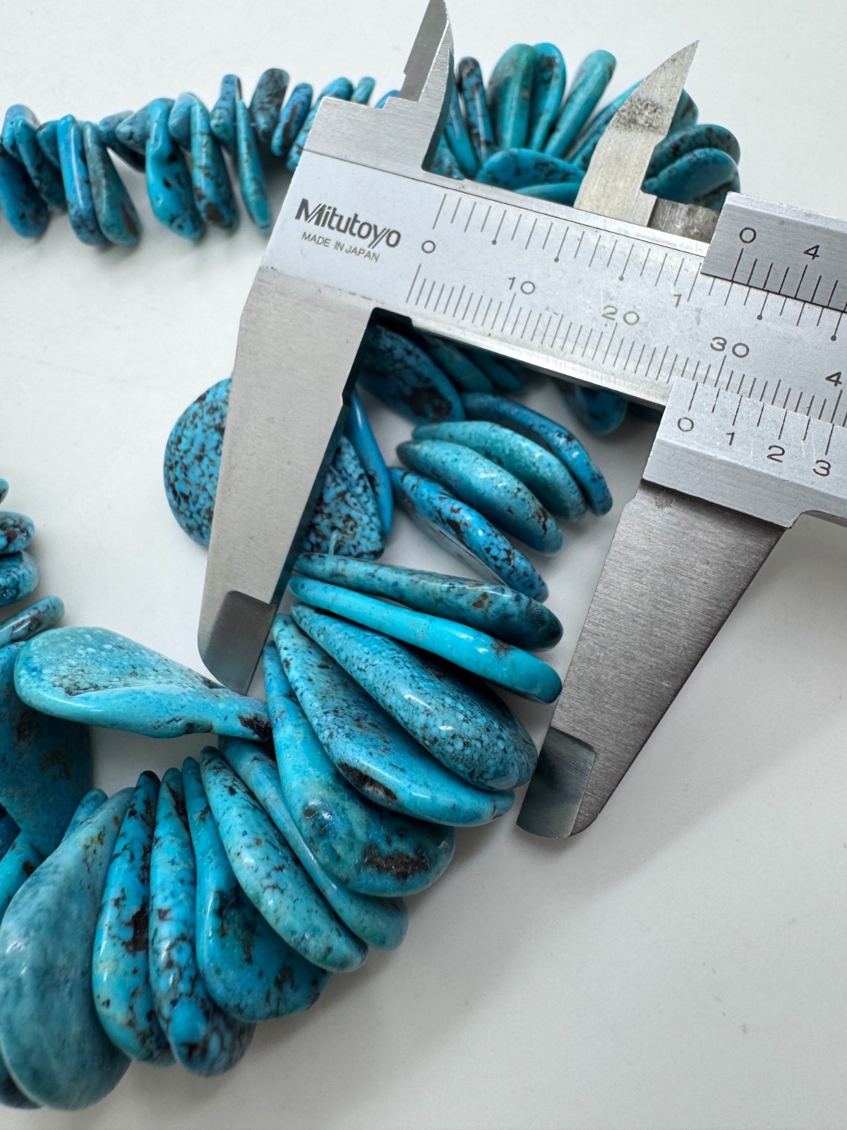 Hubei Turquoise Teardrop Natural Blue Graduated Flat Back Pear Beads PGS370