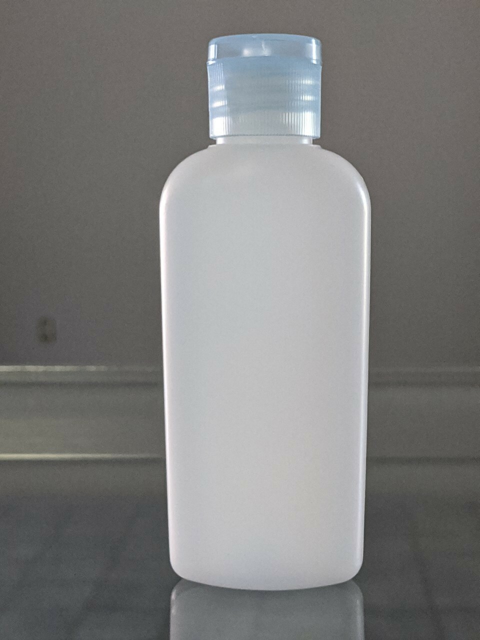2 oz Classic Oval Bottle Natural HDPE With Dispensing Lid 