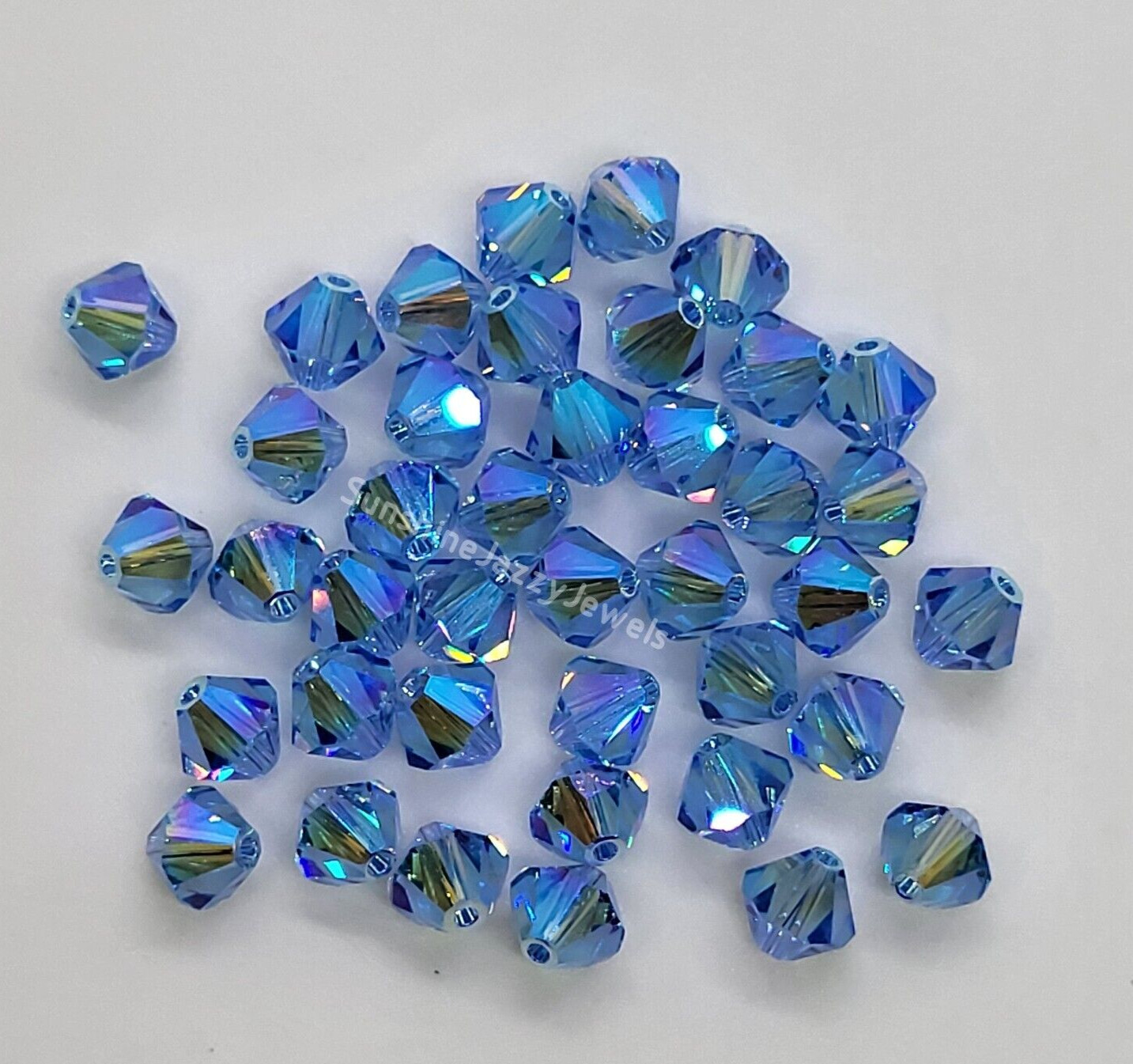 12pc Swarovski Crystal Light Sapphire AB2X 6mm Bicone 5328 Beads