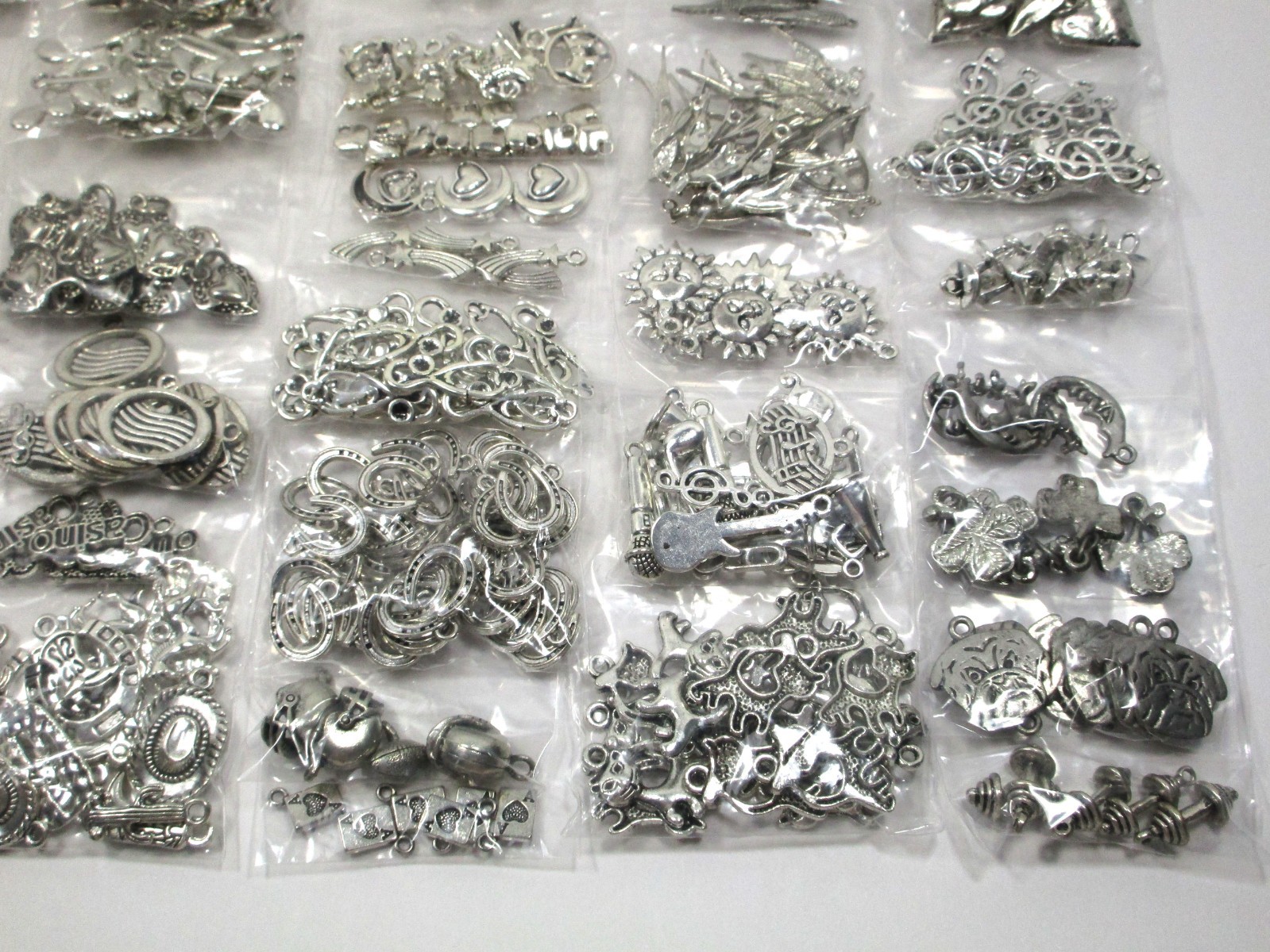 Bulk Lot – Jewelry Making Supplies – 1-1/2 lbs. Charms – Silver Tone – unused