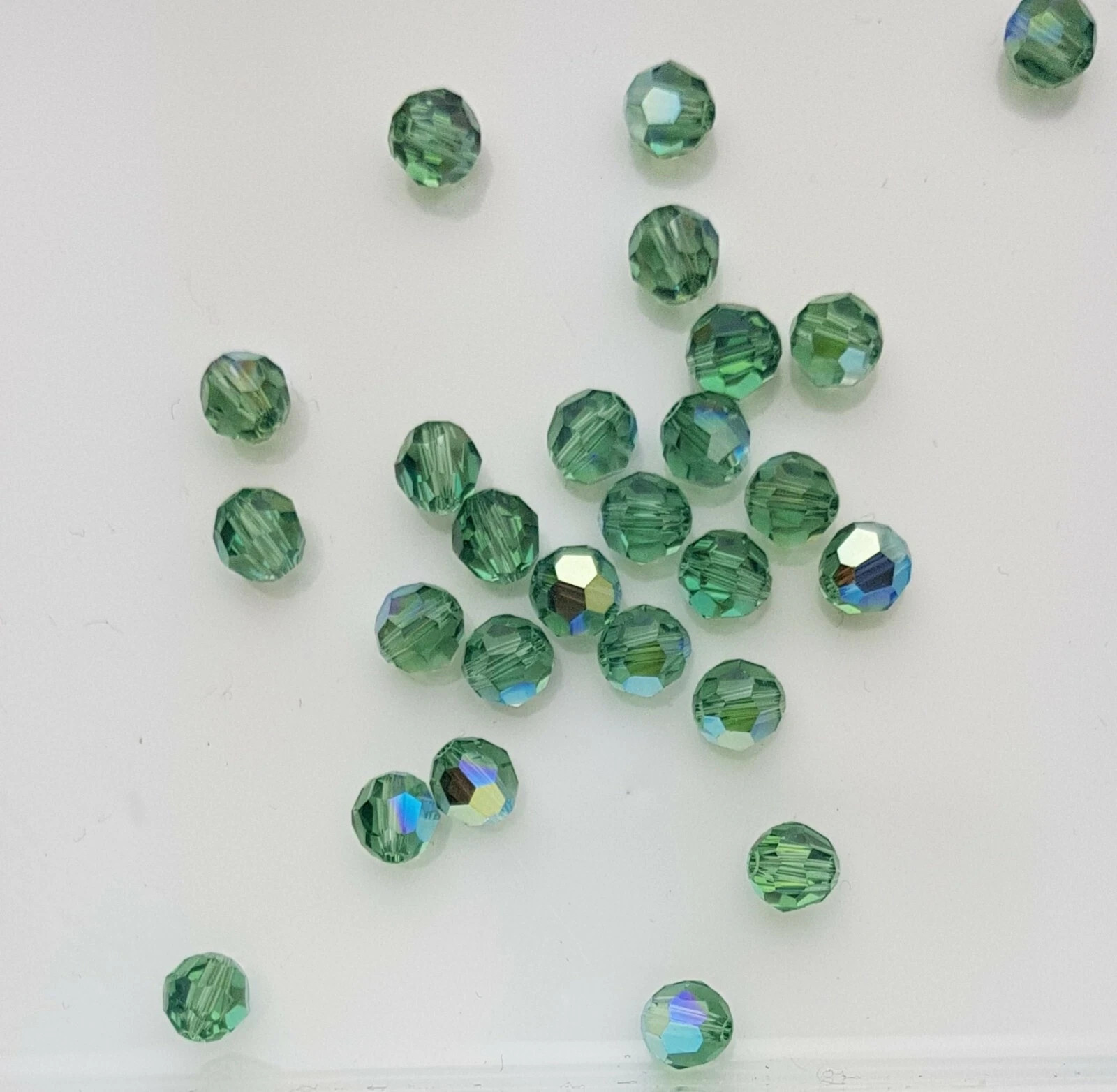 144x Swarovski 5000 Crystal AB 6mm Bicone Beads – Genuine Xilion Cut Bulk Pack