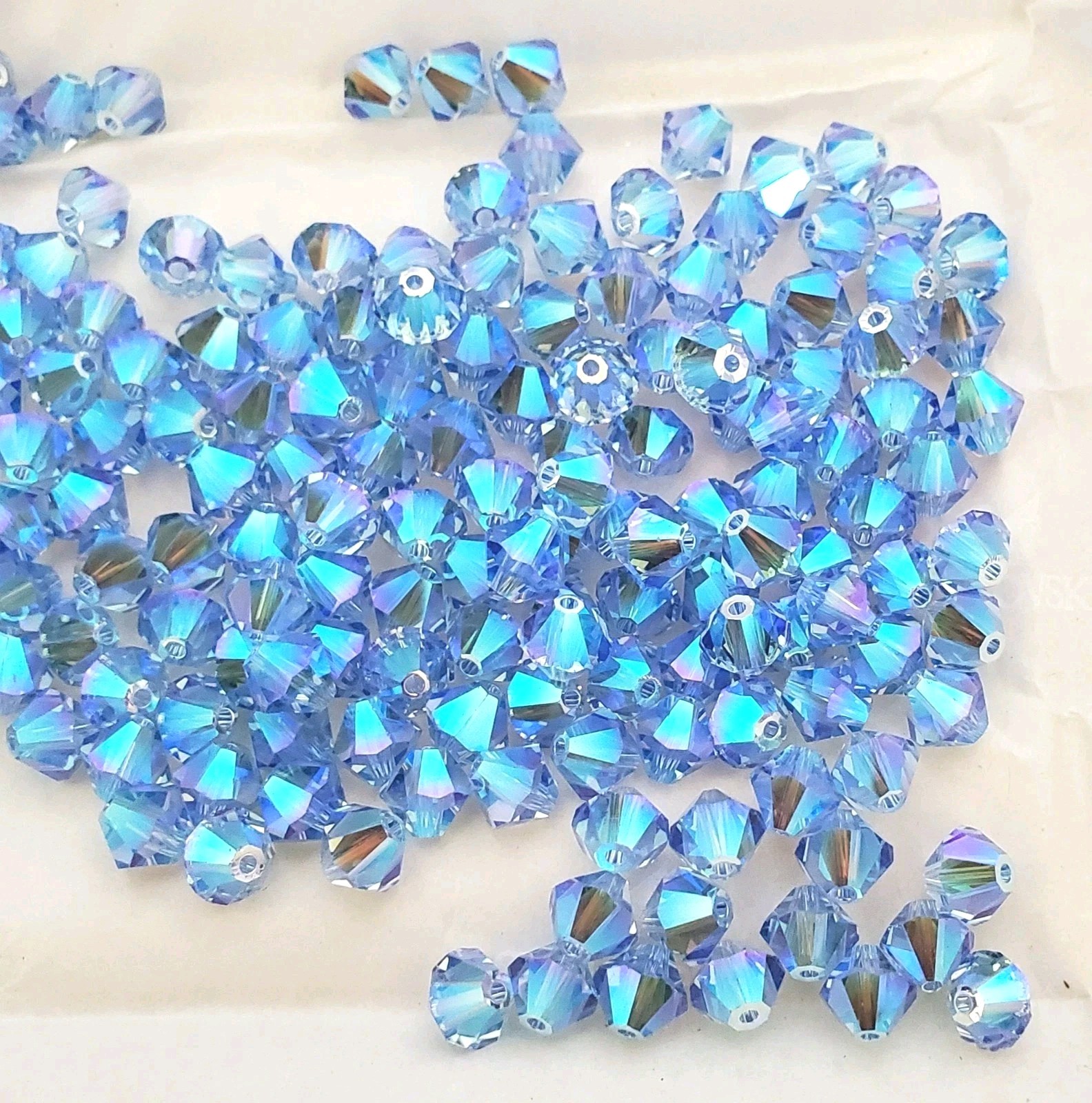 Swarovski 5301 6mm bicone beads Light Sapphire AB2X (12pcs)