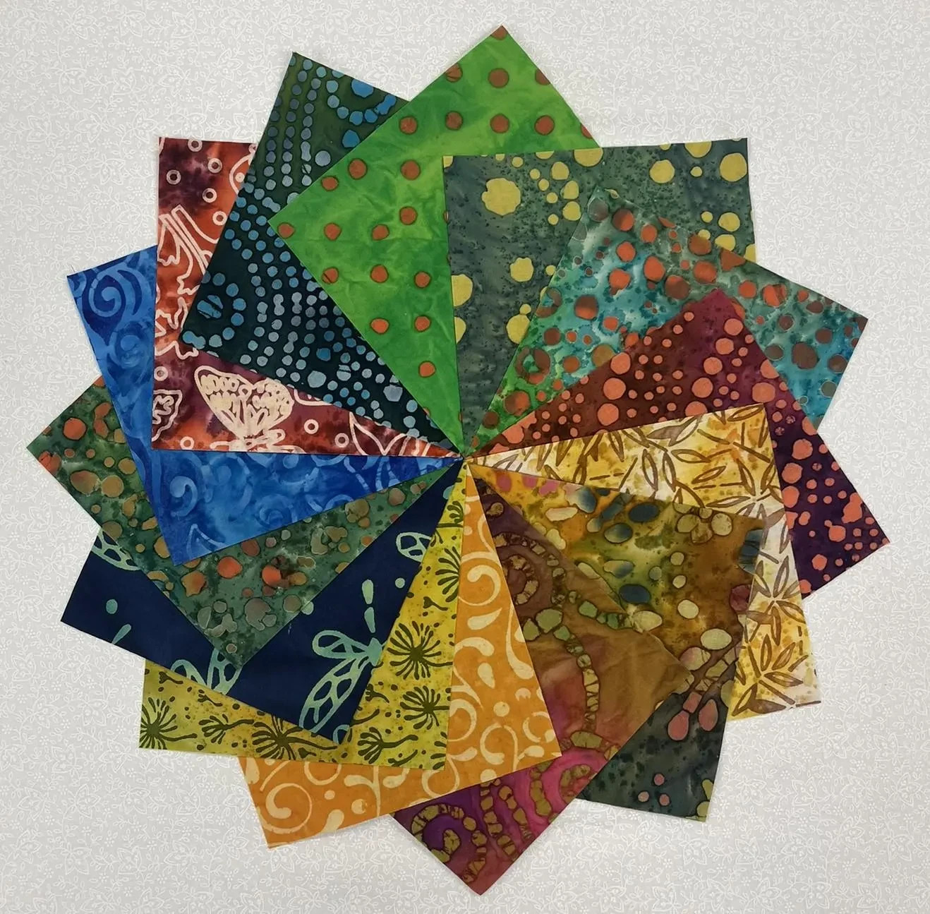 Mixed Batik Prints ~ 42 5″ Squares ~ Charm Pack of Batiks