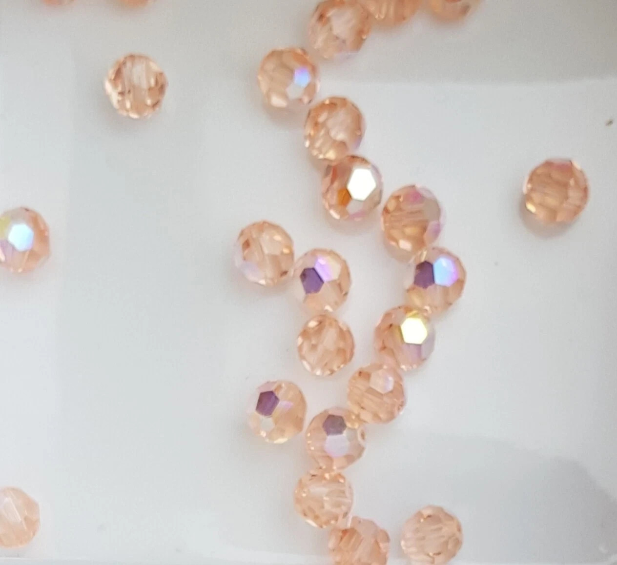 144x Swarovski 5000 Crystal AB 6mm Bicone Beads – Genuine Xilion Cut Bulk Pack