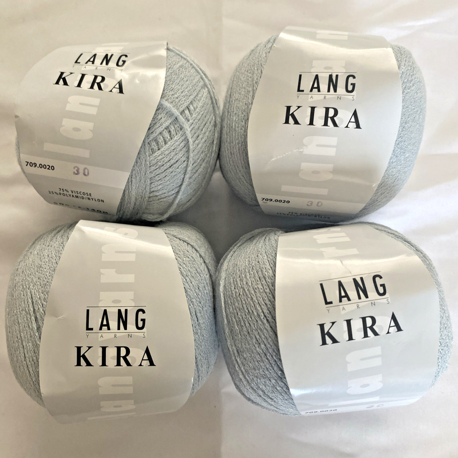 4 Rolls Lang Kira Light Blue 75% Vicose Yarn