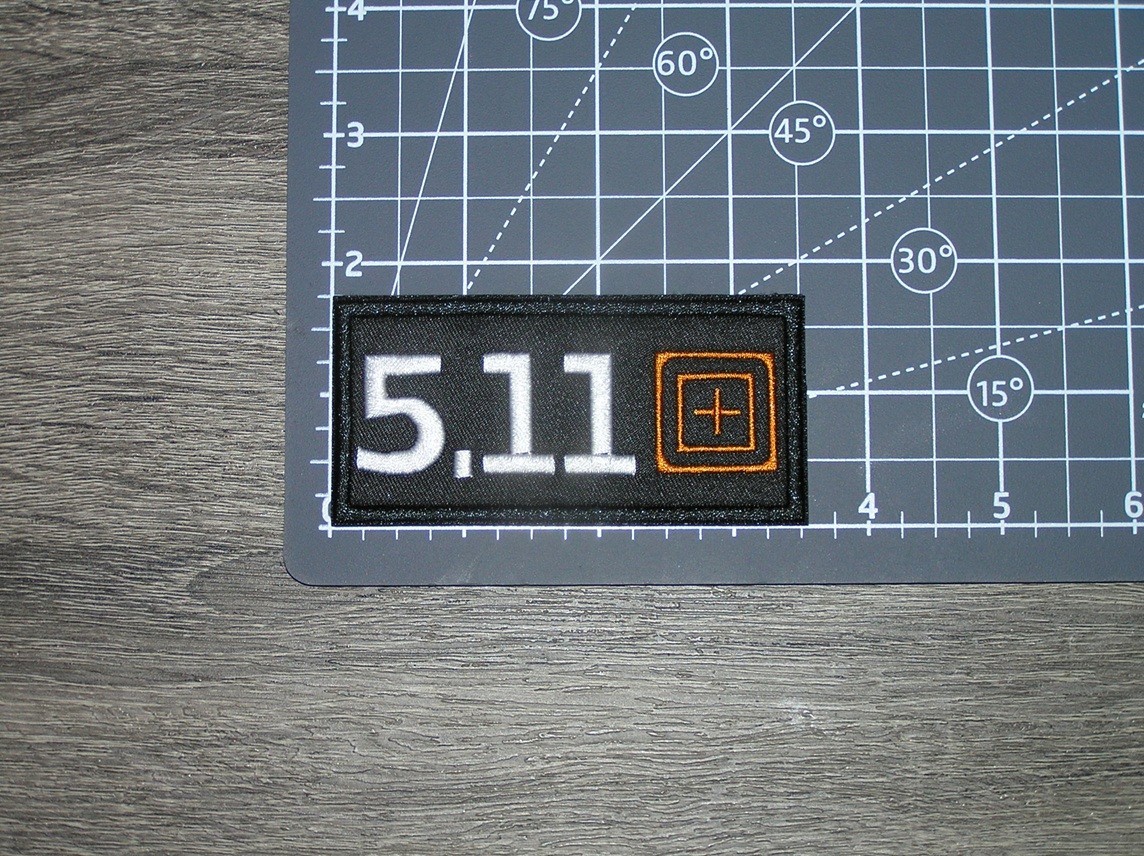 5.11 Tactical Black/White/Orange Embroidered Iron On Patch 3.5″ x 1.75″