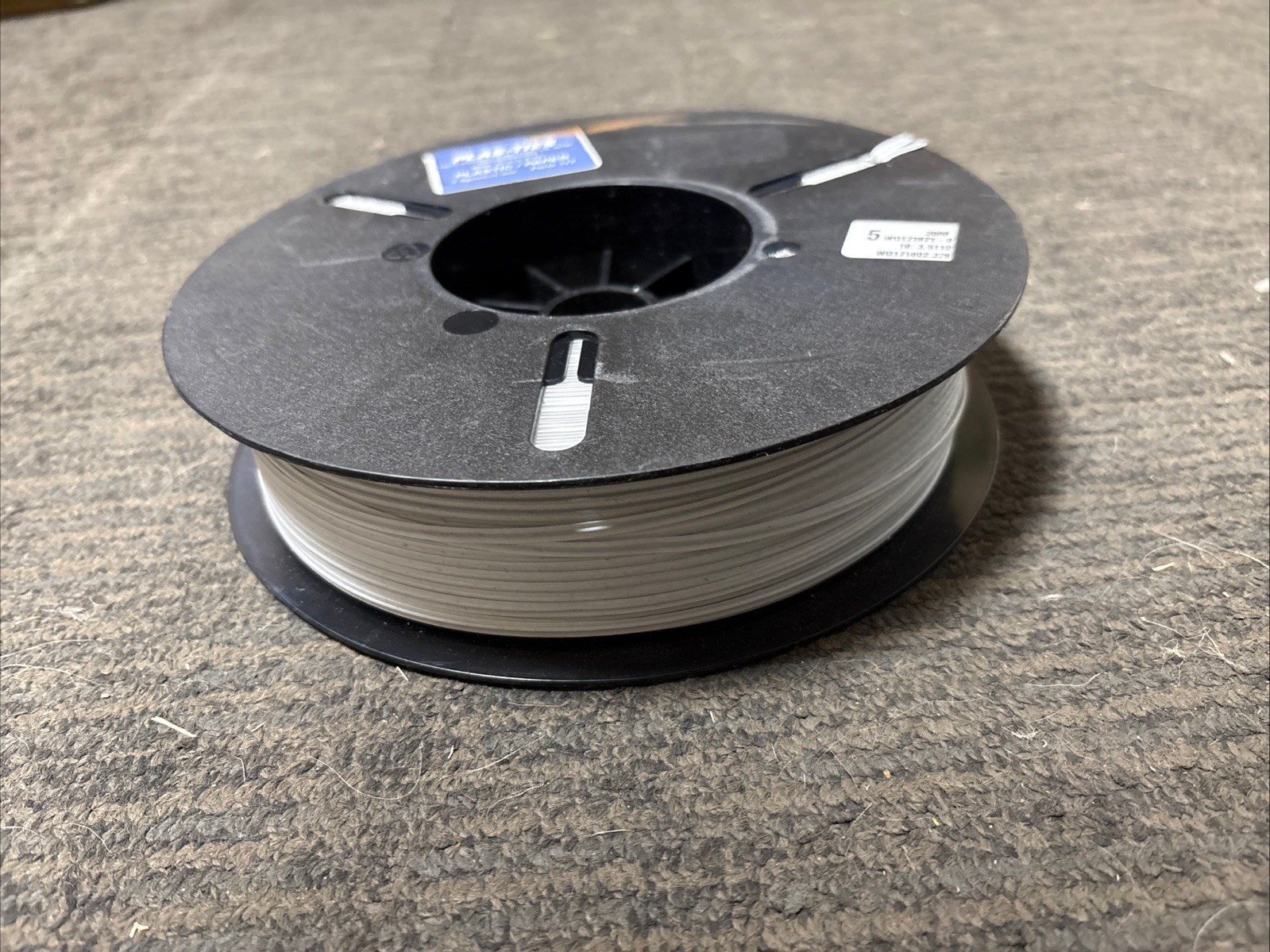 PLAS-TIES 312 5/32″ 2000ft Spooled Ties 27GA Plastic/Paper Single Wire White