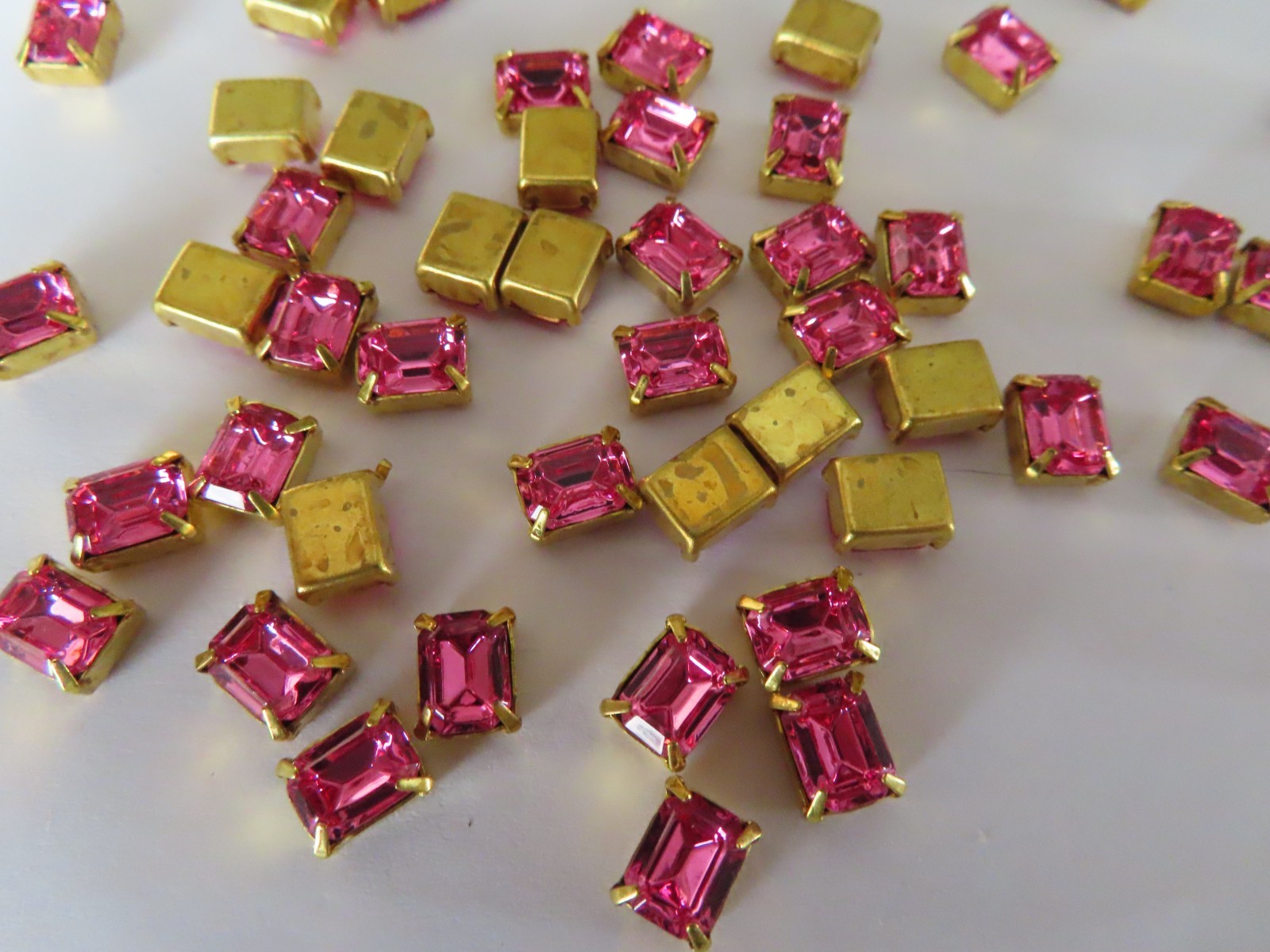 36 Swarovski Octagon Rhinestones 8x6mm Rose/Brass settings.