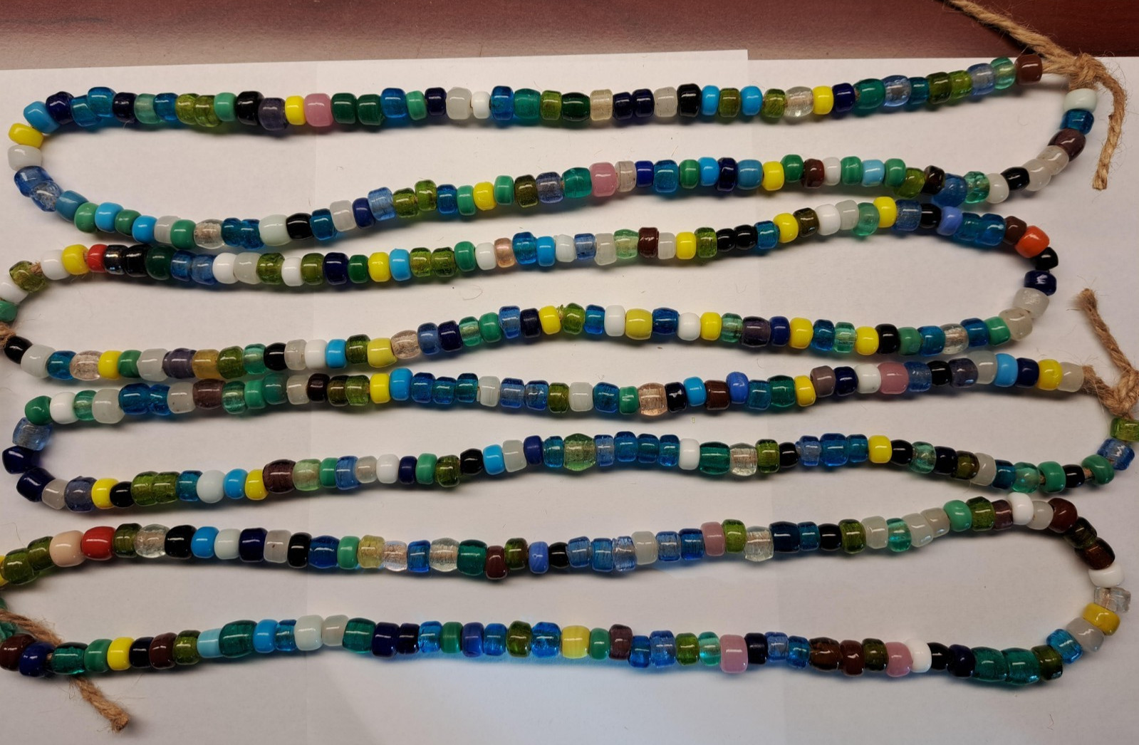 2 strands of 100 large hole, various color beads 8-9mm, hole size 3mm.