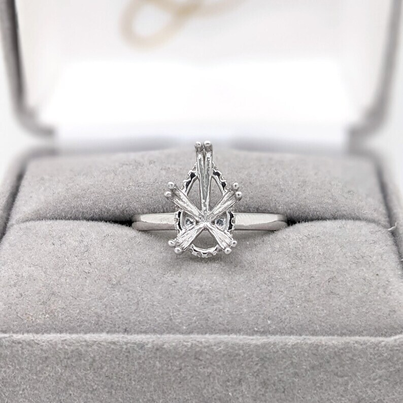 Hidden Halo Ring Semi Mount w Earth Mined Diamonds in 6×9 MM Pear Shape Ring.