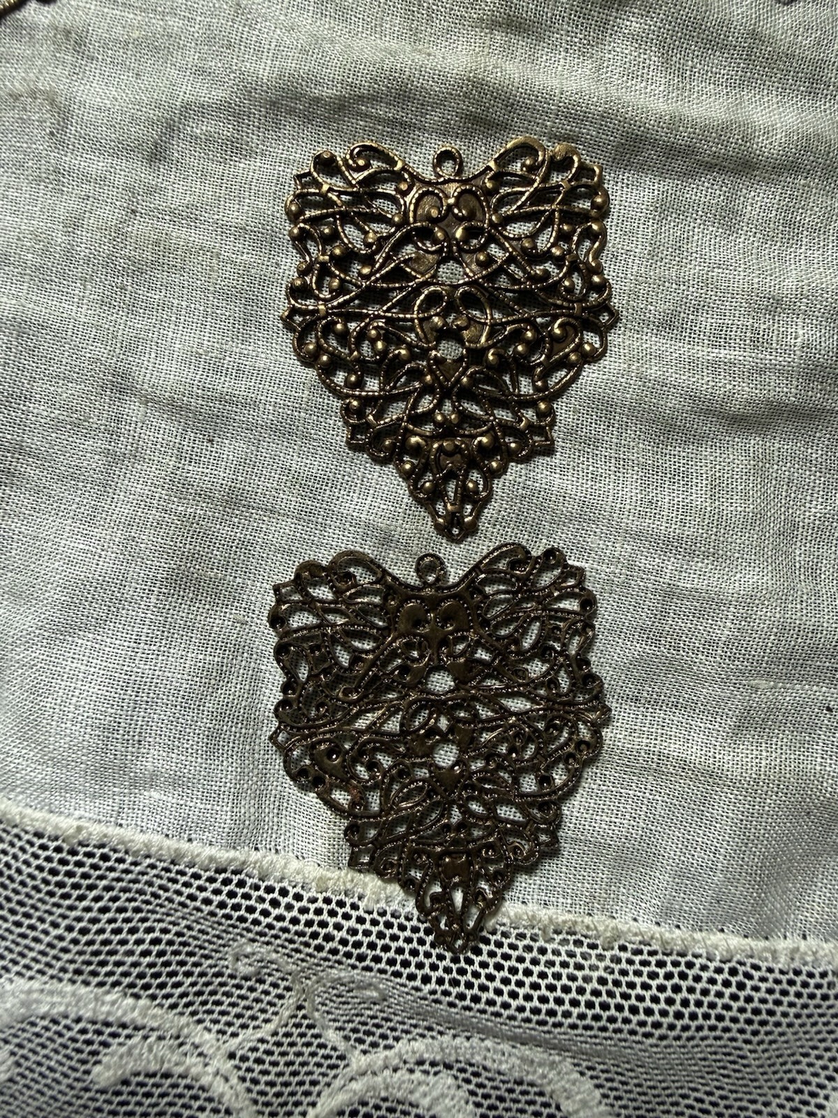 8 Antique Gold Colored Filigree Heart Shaped Dangles