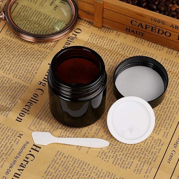 24 Pack 2oz Amber Glass Jars with Black Lids, Round Empty Containers for Scrubs