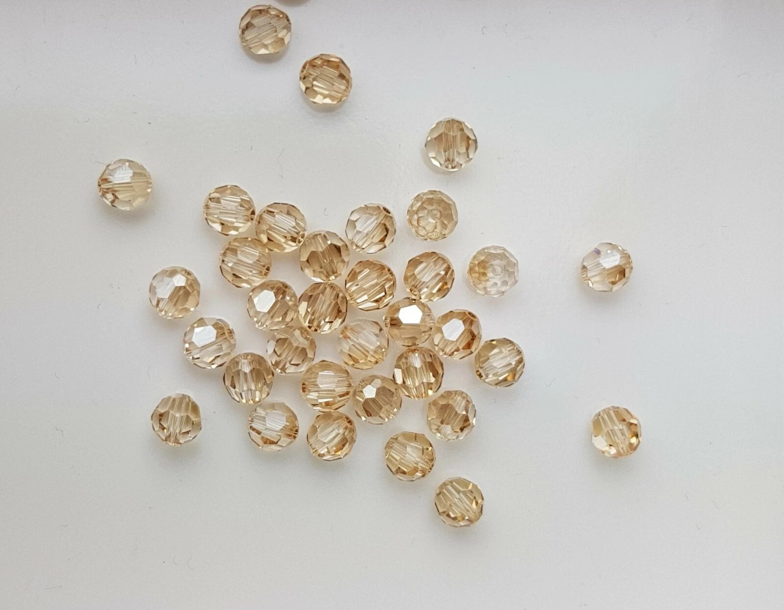 144x Swarovski 5000 Crystal AB 6mm Bicone Beads – Genuine Xilion Cut Bulk Pack