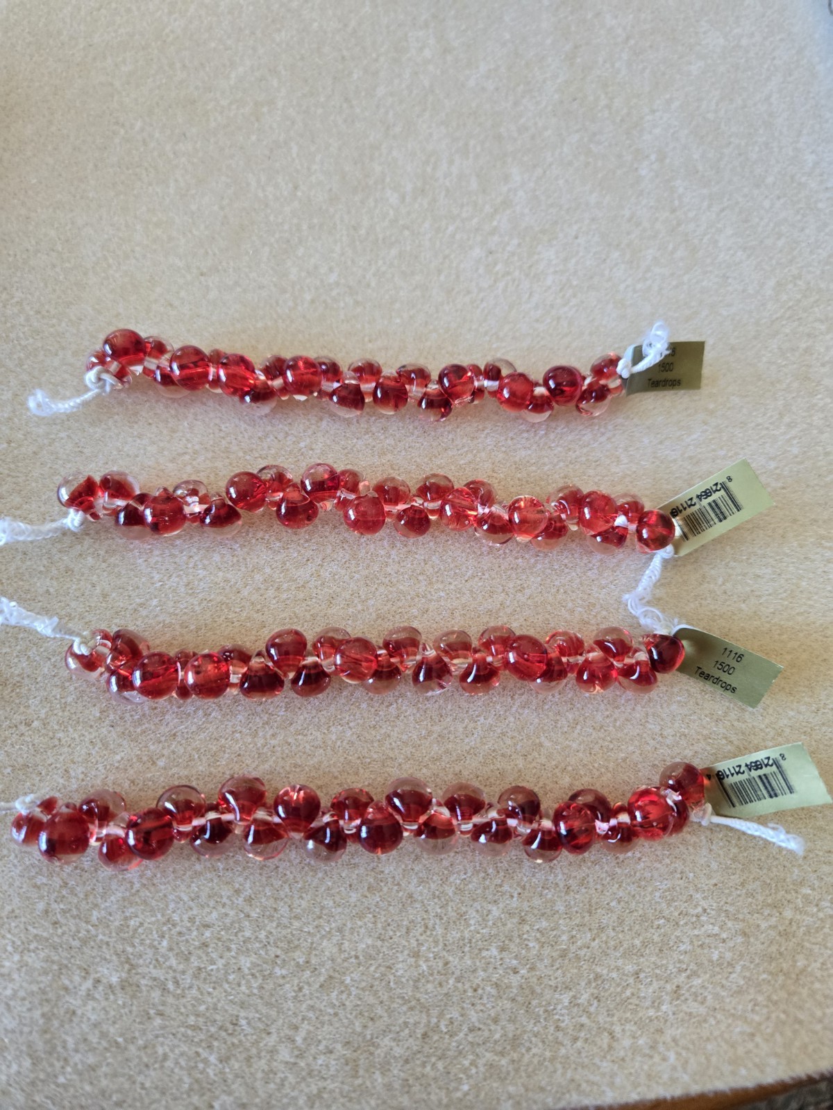 Unicorne Teardrop Glass Bead Strand, 9-10mm, Red
