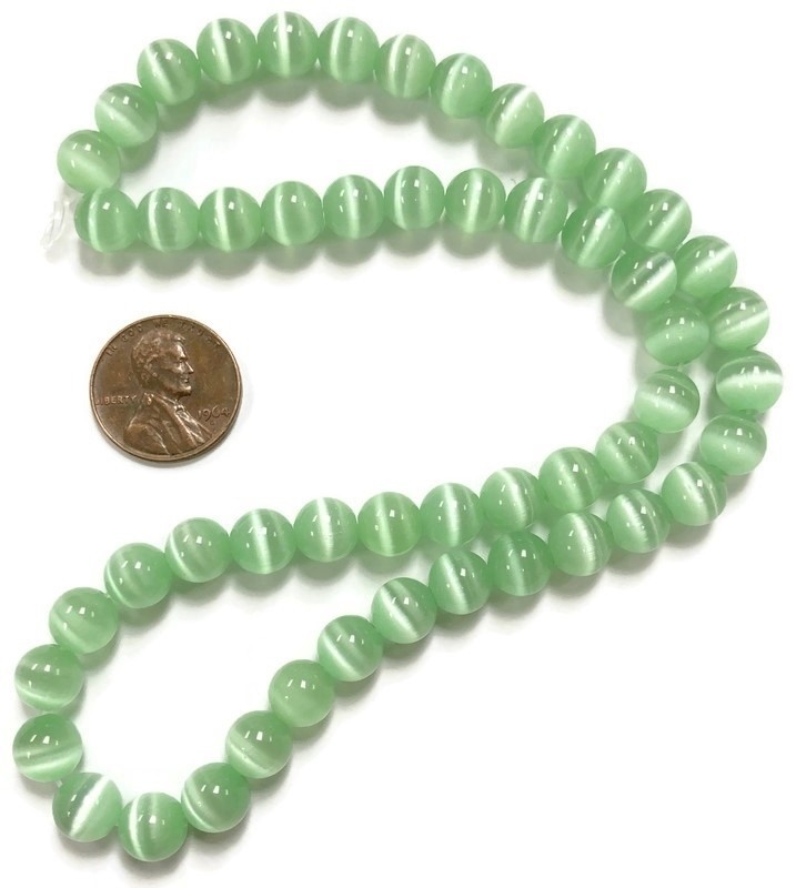 50 Cat’s Eye Fiber Optic Glass Erinite Green 8mm. Smooth Round Beads 2585