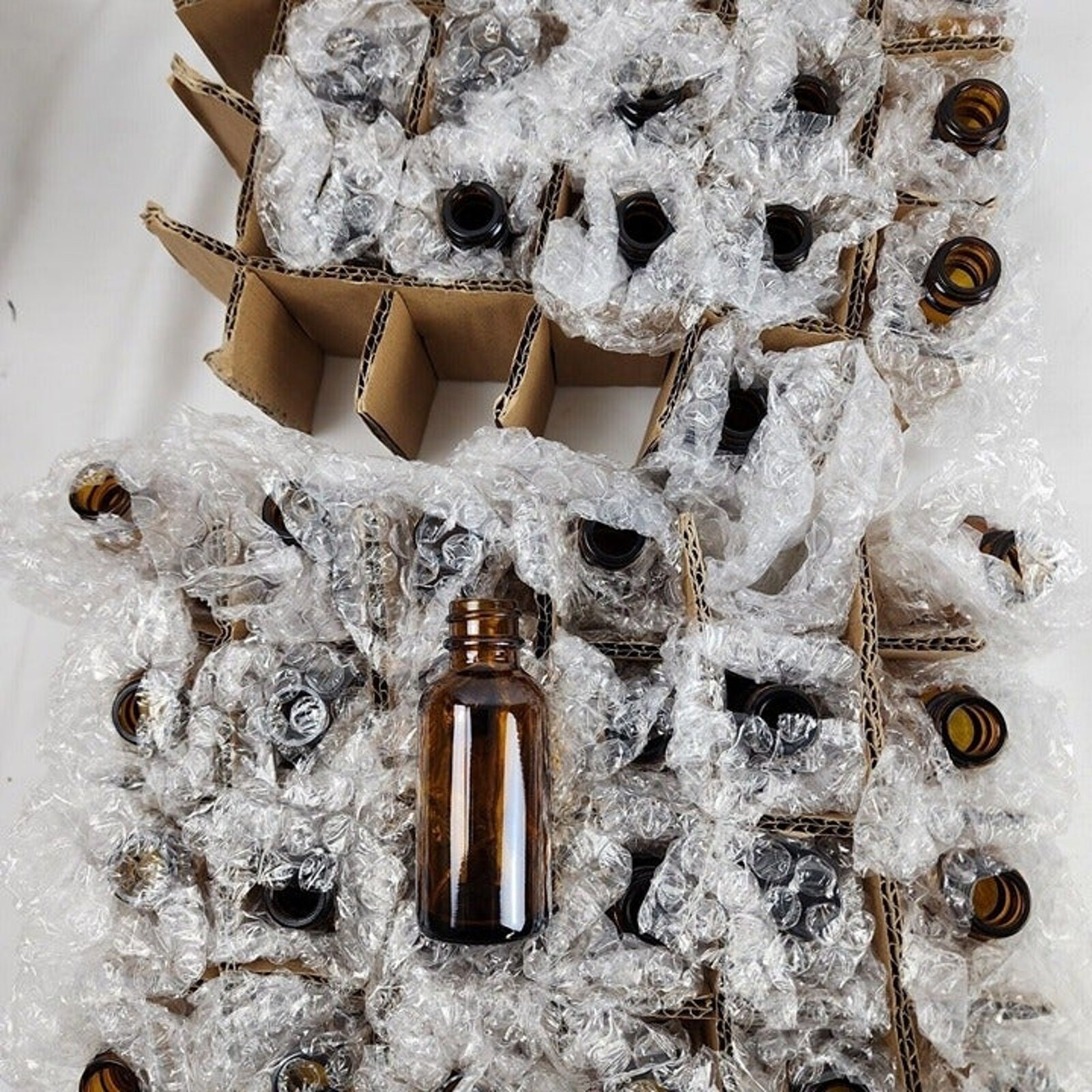 39-Count, Boston Round Glass Bottles, Amber, 40 mL, NO TOPS
