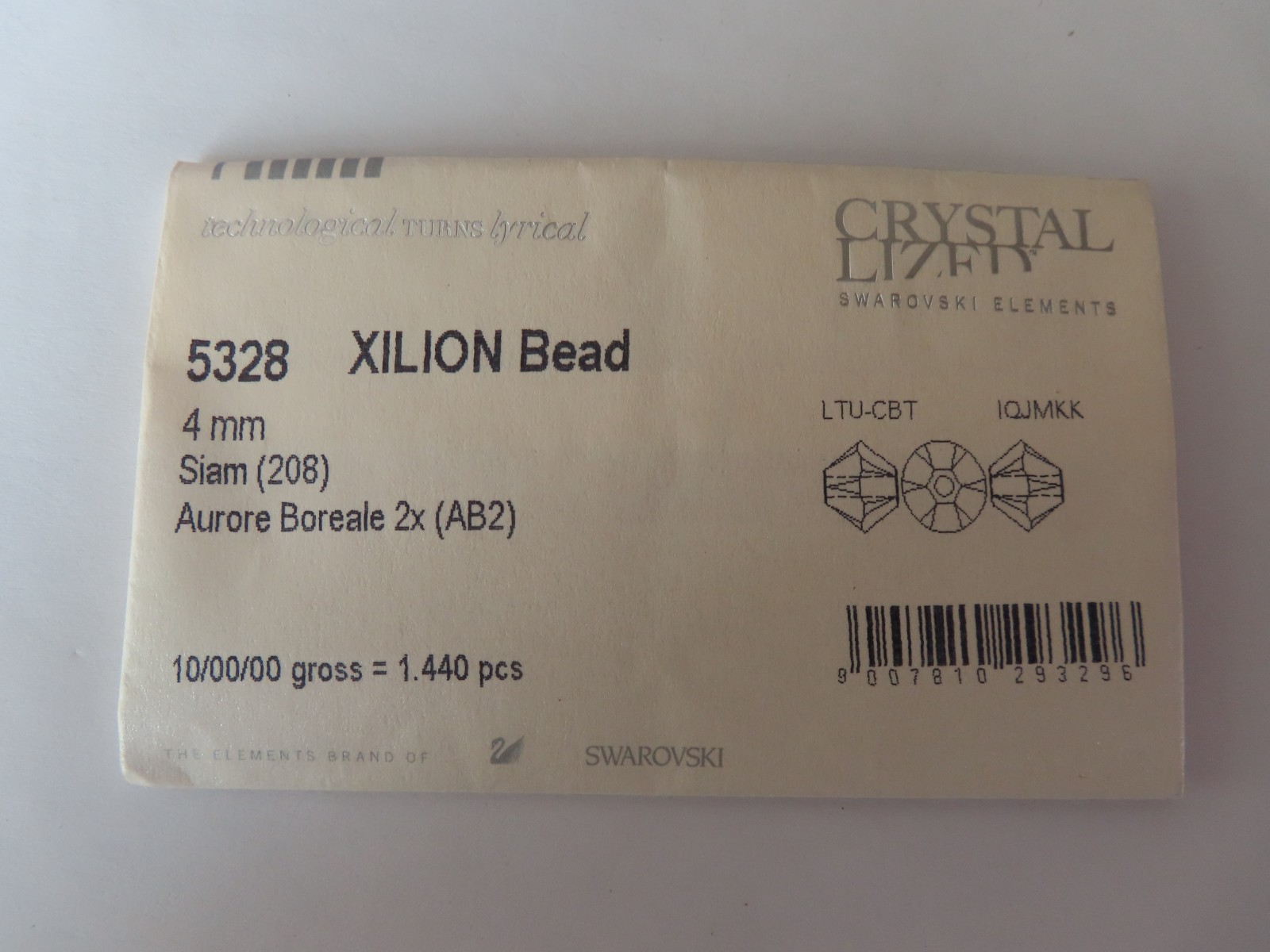 36 Swarovski Bicone Beads 4mm Siam AB 2x. #5328