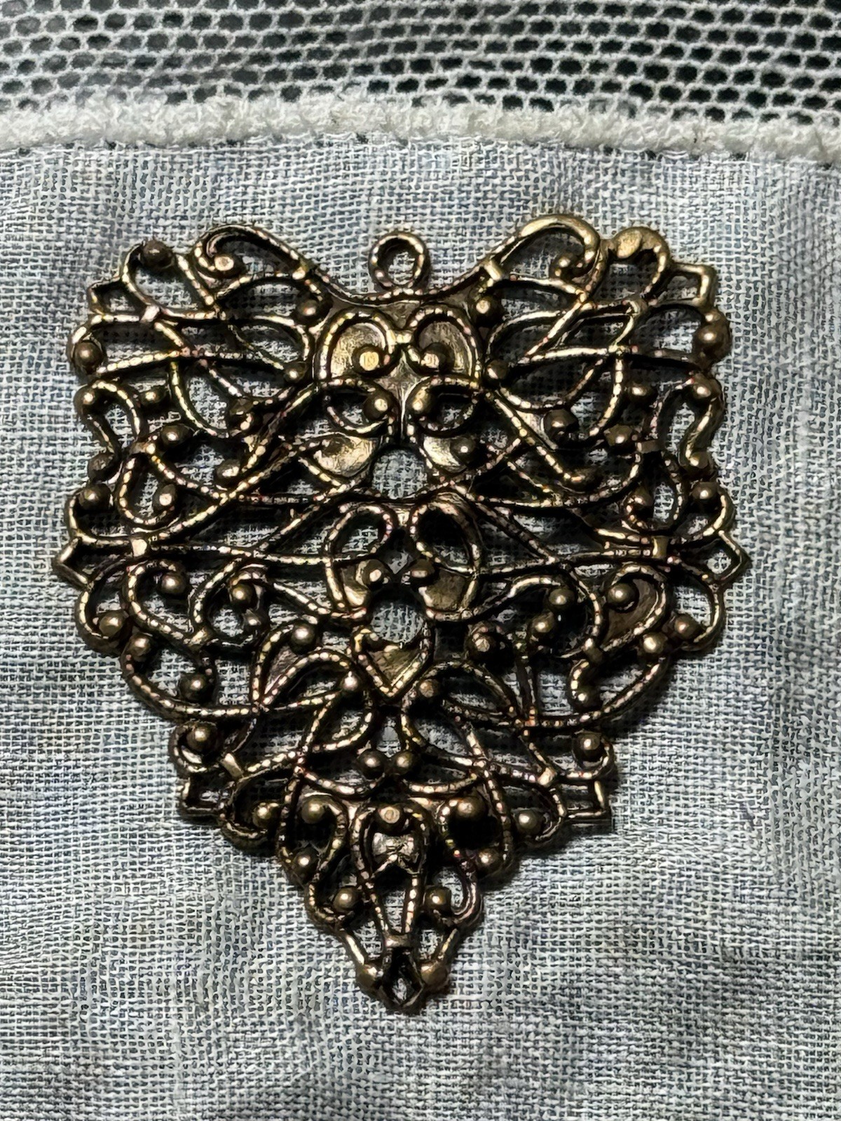 8 Antique Gold Colored Filigree Heart Shaped Dangles
